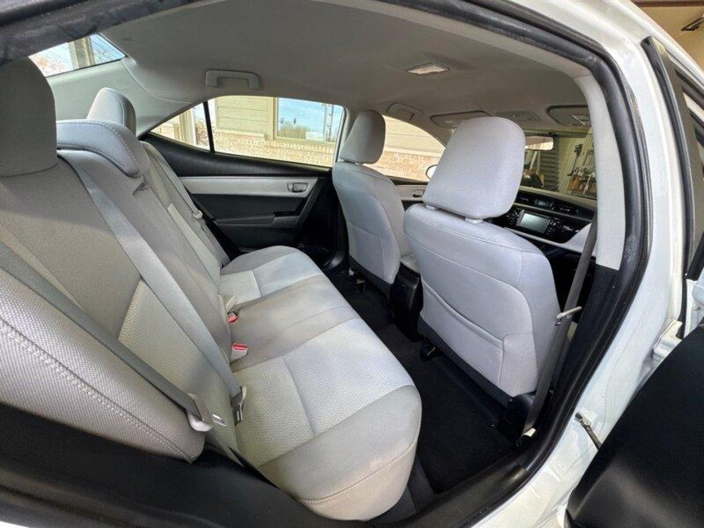 2016 Super White Toyota Corolla L (5YFBURHE2GP) with an 1.8L I4 132hp 128ft. lbs. engine, Automatic transmission, located at 25355 Eames Street, Channahon, IL, 60410, (815) 467-1807, 41.429108, -88.228432 - Introducing the immaculate 2016 Toyota Corolla L, a masterpiece of automotive engineering that seamlessly combines style, performance, and efficiency. With a robust 1.8L I4 engine delivering a spirited 132hp and 128ft. lbs. of torque, every drive is a thrilling experience. Step inside this pristine - Photo#14