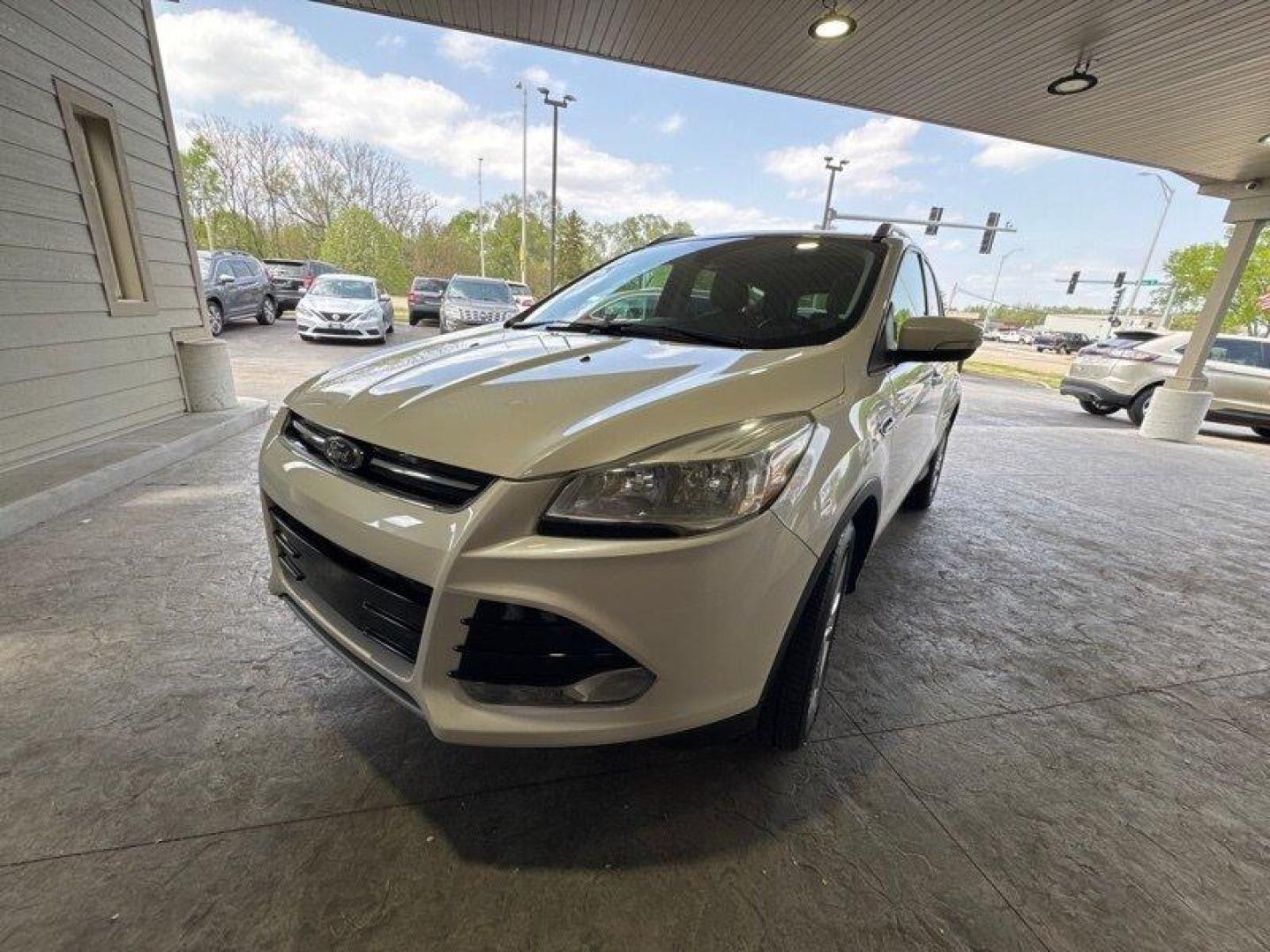 2016 White Platinum Metallic Tri-Coat Ford Escape Titanium (1FMCU9JX1GU) with an EcoBoost 1.6L Turbo I4 178hp 184ft. lbs. engine, 6-Speed Shiftable Au transmission, located at 25355 Eames Street, Channahon, IL, 60410, (815) 467-1807, 41.429108, -88.228432 - Step into the lap of luxury with this 2016 Ford Escape Titanium in a dazzling White Platinum Metallic Tri-Coat exterior and a cozy Medium Light Stone interior that screams sophistication. Powered by an impressive EcoBoost 1.6L Turbo I4 engine, this beauty boasts a respectable 178hp and 184ft. lbs. o - Photo#7