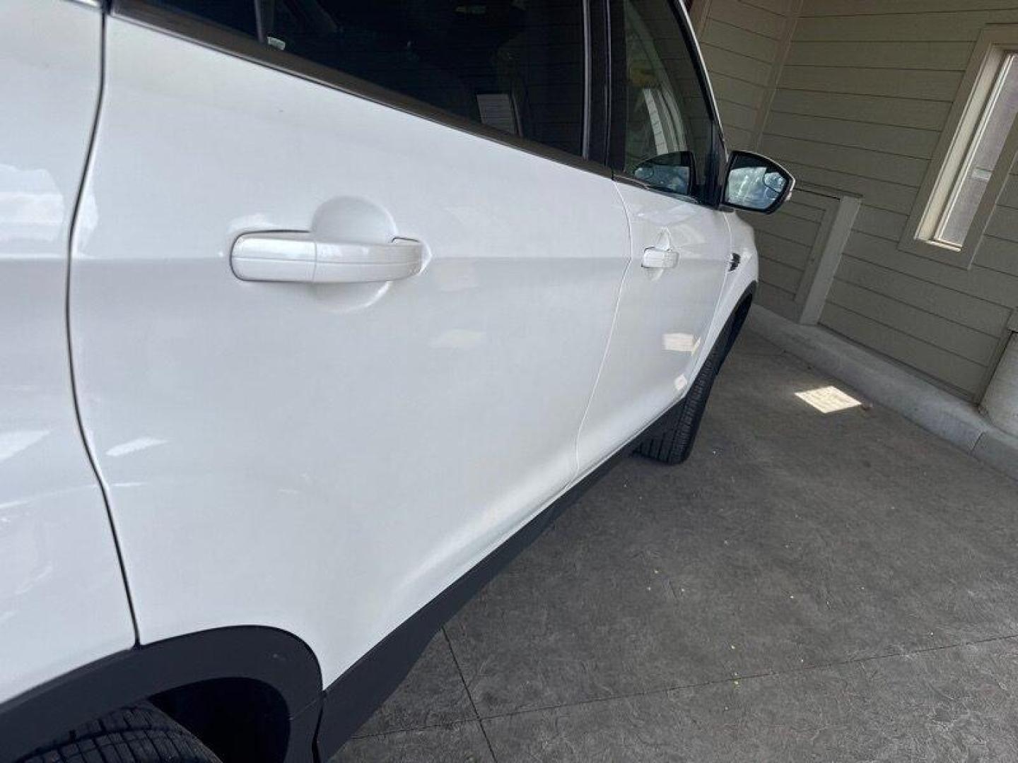 2016 White Platinum Metallic Tri-Coat Ford Escape Titanium (1FMCU9JX1GU) with an EcoBoost 1.6L Turbo I4 178hp 184ft. lbs. engine, 6-Speed Shiftable Au transmission, located at 25355 Eames Street, Channahon, IL, 60410, (815) 467-1807, 41.429108, -88.228432 - Step into the lap of luxury with this 2016 Ford Escape Titanium in a dazzling White Platinum Metallic Tri-Coat exterior and a cozy Medium Light Stone interior that screams sophistication. Powered by an impressive EcoBoost 1.6L Turbo I4 engine, this beauty boasts a respectable 178hp and 184ft. lbs. o - Photo#10