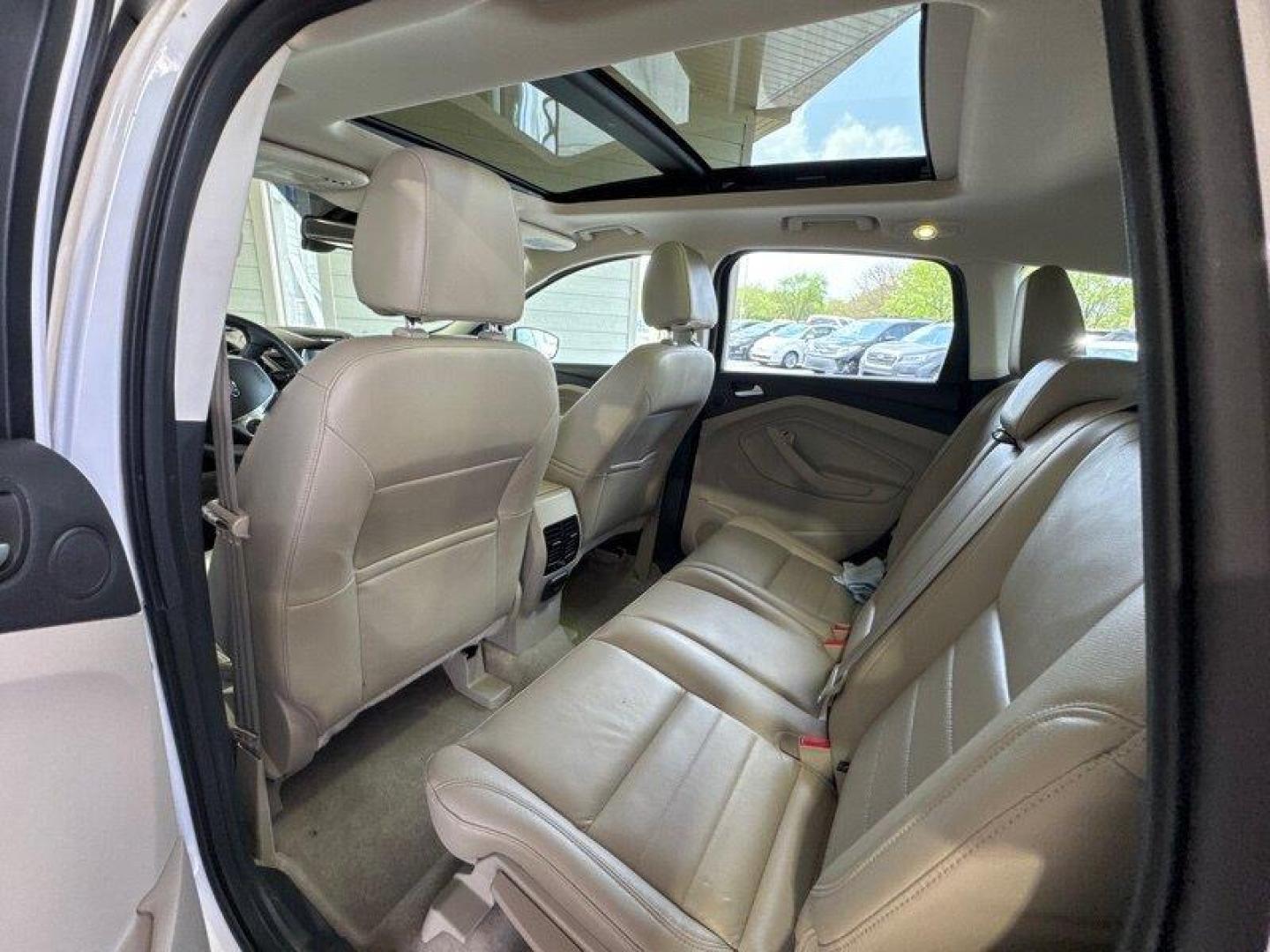 2016 White Platinum Metallic Tri-Coat Ford Escape Titanium (1FMCU9JX1GU) with an EcoBoost 1.6L Turbo I4 178hp 184ft. lbs. engine, 6-Speed Shiftable Au transmission, located at 25355 Eames Street, Channahon, IL, 60410, (815) 467-1807, 41.429108, -88.228432 - Step into the lap of luxury with this 2016 Ford Escape Titanium in a dazzling White Platinum Metallic Tri-Coat exterior and a cozy Medium Light Stone interior that screams sophistication. Powered by an impressive EcoBoost 1.6L Turbo I4 engine, this beauty boasts a respectable 178hp and 184ft. lbs. o - Photo#13