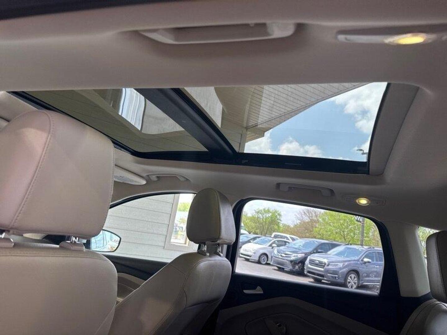 2016 White Platinum Metallic Tri-Coat Ford Escape Titanium (1FMCU9JX1GU) with an EcoBoost 1.6L Turbo I4 178hp 184ft. lbs. engine, 6-Speed Shiftable Au transmission, located at 25355 Eames Street, Channahon, IL, 60410, (815) 467-1807, 41.429108, -88.228432 - Step into the lap of luxury with this 2016 Ford Escape Titanium in a dazzling White Platinum Metallic Tri-Coat exterior and a cozy Medium Light Stone interior that screams sophistication. Powered by an impressive EcoBoost 1.6L Turbo I4 engine, this beauty boasts a respectable 178hp and 184ft. lbs. o - Photo#19