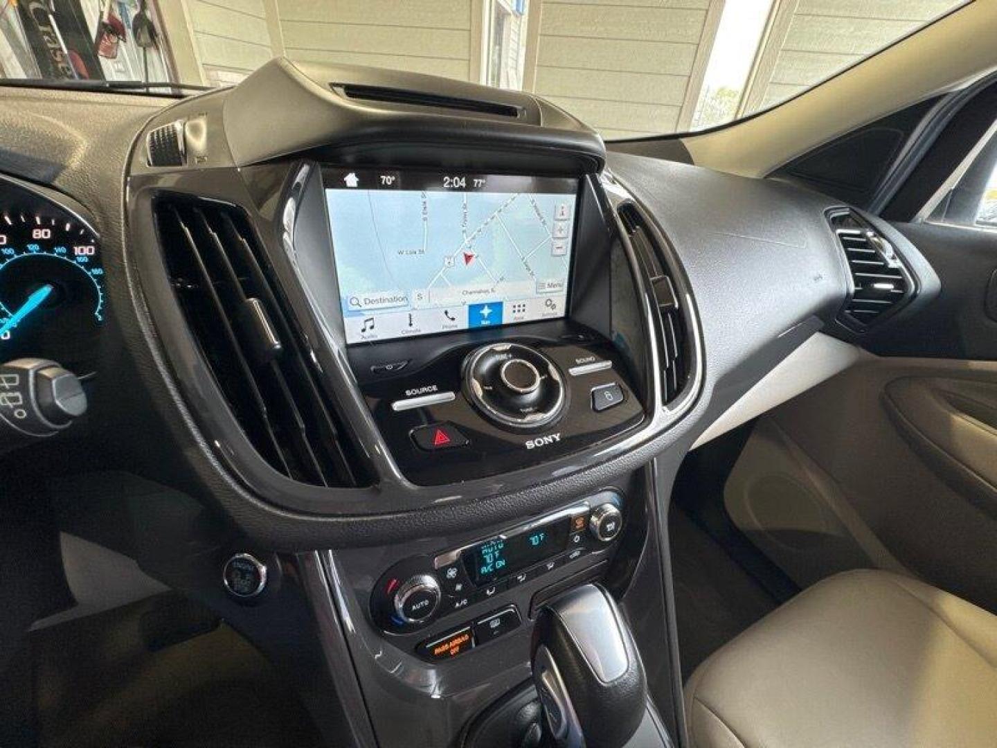 2016 White Platinum Metallic Tri-Coat Ford Escape Titanium (1FMCU9JX1GU) with an EcoBoost 1.6L Turbo I4 178hp 184ft. lbs. engine, 6-Speed Shiftable Au transmission, located at 25355 Eames Street, Channahon, IL, 60410, (815) 467-1807, 41.429108, -88.228432 - Step into the lap of luxury with this 2016 Ford Escape Titanium in a dazzling White Platinum Metallic Tri-Coat exterior and a cozy Medium Light Stone interior that screams sophistication. Powered by an impressive EcoBoost 1.6L Turbo I4 engine, this beauty boasts a respectable 178hp and 184ft. lbs. o - Photo#20