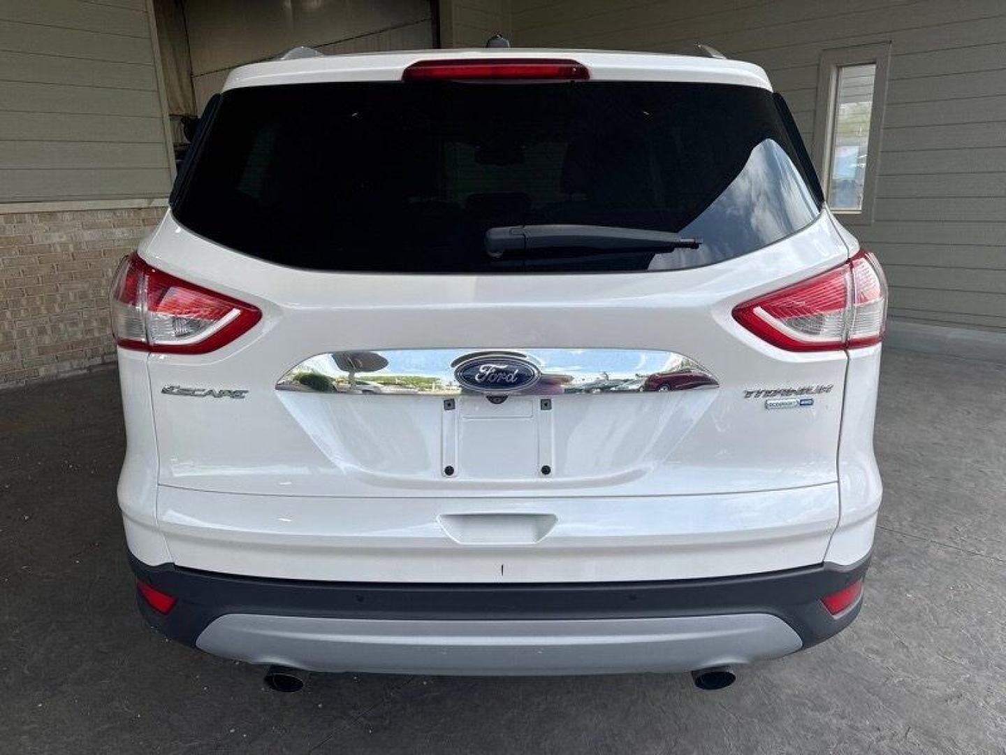 2016 White Platinum Metallic Tri-Coat Ford Escape Titanium (1FMCU9JX1GU) with an EcoBoost 1.6L Turbo I4 178hp 184ft. lbs. engine, 6-Speed Shiftable Au transmission, located at 25355 Eames Street, Channahon, IL, 60410, (815) 467-1807, 41.429108, -88.228432 - Step into the lap of luxury with this 2016 Ford Escape Titanium in a dazzling White Platinum Metallic Tri-Coat exterior and a cozy Medium Light Stone interior that screams sophistication. Powered by an impressive EcoBoost 1.6L Turbo I4 engine, this beauty boasts a respectable 178hp and 184ft. lbs. o - Photo#4