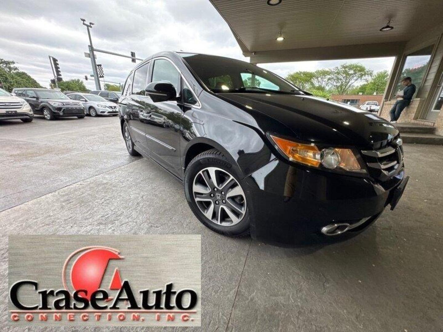 2016 Crystal Black Pearl Honda Odyssey Touring (5FNRL5H95GB) with an 3.5L V6 248hp 250ft. lbs. engine, Automatic transmission, located at 25355 Eames Street, Channahon, IL, 60410, (815) 467-1807, 41.429108, -88.228432 - Introducing the powerhouse on wheels - the 2016 Honda Odyssey Touring! This beast is equipped with a roaring 3.5L V6 engine that cranks out a jaw-dropping 248hp and 250ft. lbs. of torque. Dominating the roads with its sleek design and powerful performance, this van is not to be underestimated. Step - Photo#0