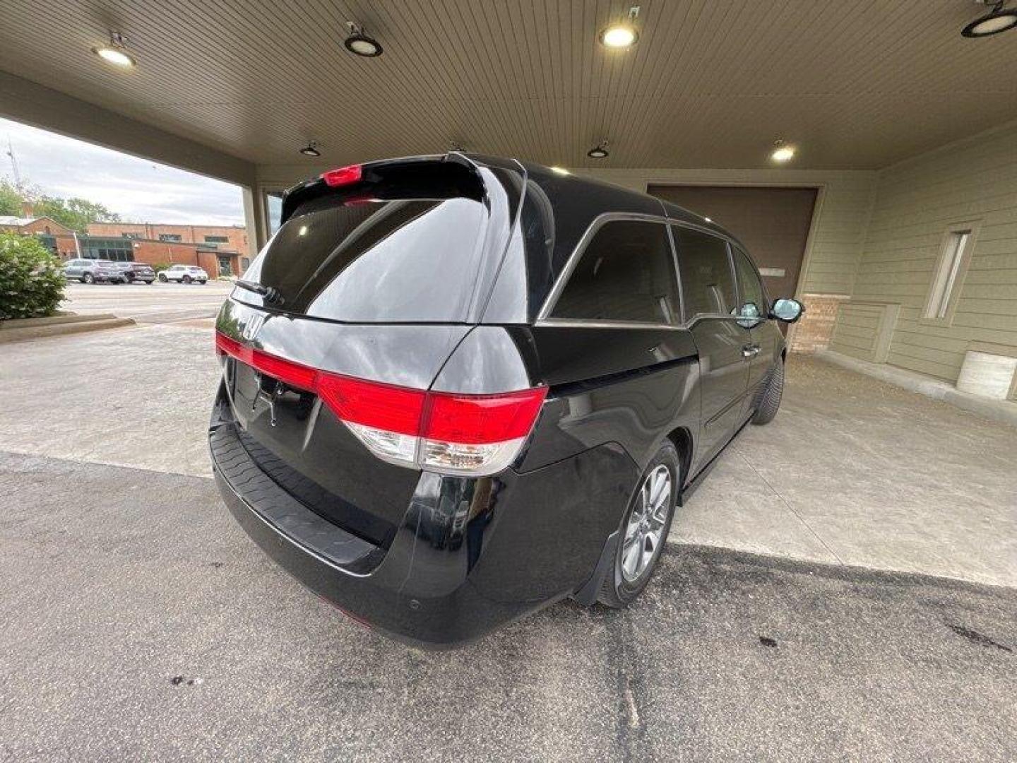 2016 Crystal Black Pearl Honda Odyssey Touring (5FNRL5H95GB) with an 3.5L V6 248hp 250ft. lbs. engine, Automatic transmission, located at 25355 Eames Street, Channahon, IL, 60410, (815) 467-1807, 41.429108, -88.228432 - Introducing the powerhouse on wheels - the 2016 Honda Odyssey Touring! This beast is equipped with a roaring 3.5L V6 engine that cranks out a jaw-dropping 248hp and 250ft. lbs. of torque. Dominating the roads with its sleek design and powerful performance, this van is not to be underestimated. Step - Photo#3