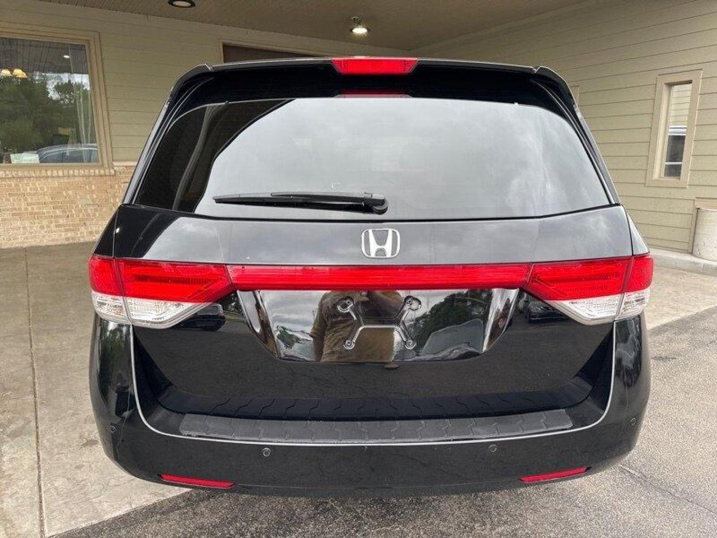 2016 Crystal Black Pearl Honda Odyssey Touring (5FNRL5H95GB) with an 3.5L V6 248hp 250ft. lbs. engine, Automatic transmission, located at 25355 Eames Street, Channahon, IL, 60410, (815) 467-1807, 41.429108, -88.228432 - Introducing the powerhouse on wheels - the 2016 Honda Odyssey Touring! This beast is equipped with a roaring 3.5L V6 engine that cranks out a jaw-dropping 248hp and 250ft. lbs. of torque. Dominating the roads with its sleek design and powerful performance, this van is not to be underestimated. Step - Photo#4