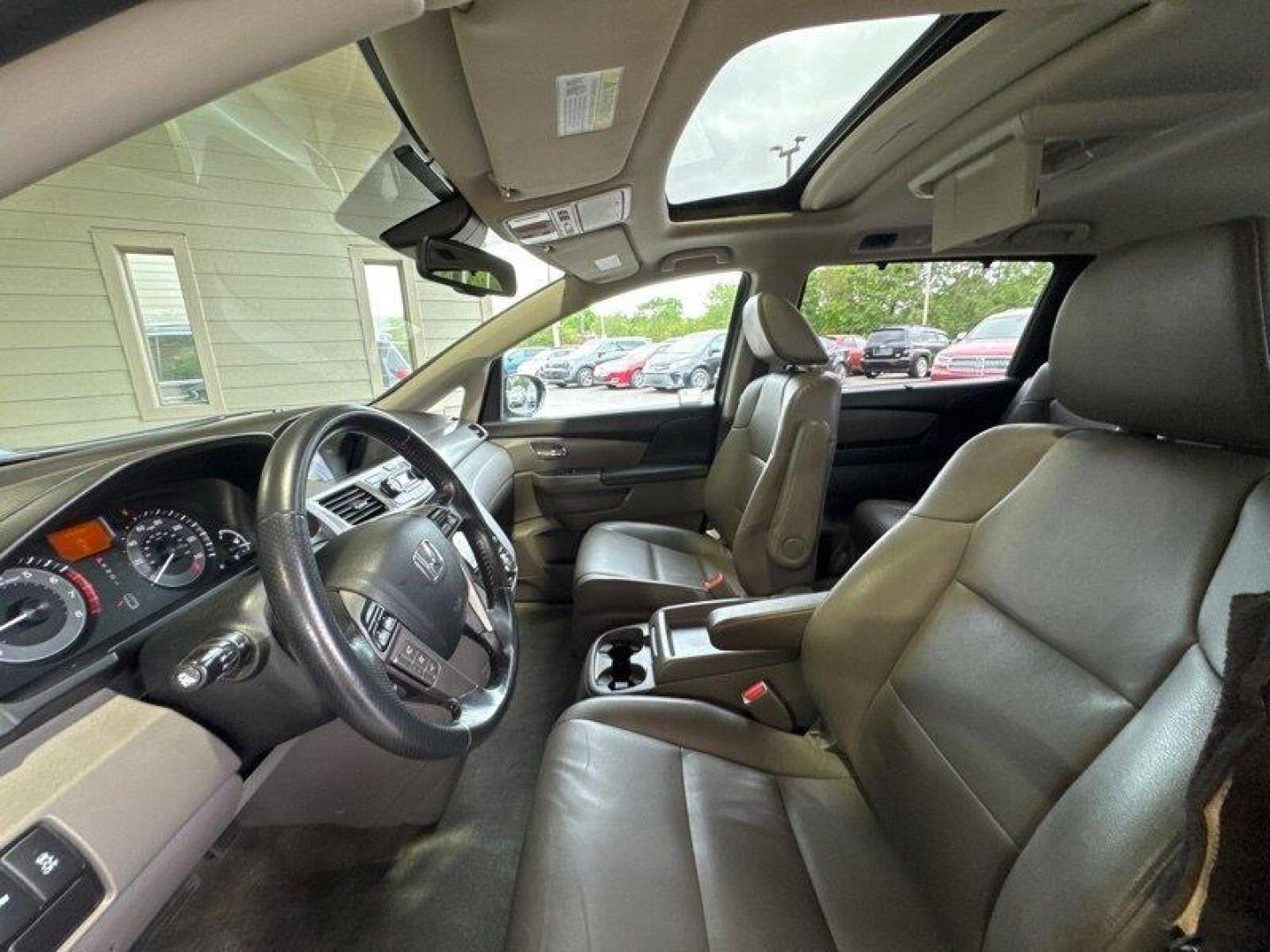 2016 Crystal Black Pearl Honda Odyssey Touring (5FNRL5H95GB) with an 3.5L V6 248hp 250ft. lbs. engine, Automatic transmission, located at 25355 Eames Street, Channahon, IL, 60410, (815) 467-1807, 41.429108, -88.228432 - Introducing the powerhouse on wheels - the 2016 Honda Odyssey Touring! This beast is equipped with a roaring 3.5L V6 engine that cranks out a jaw-dropping 248hp and 250ft. lbs. of torque. Dominating the roads with its sleek design and powerful performance, this van is not to be underestimated. Step - Photo#11