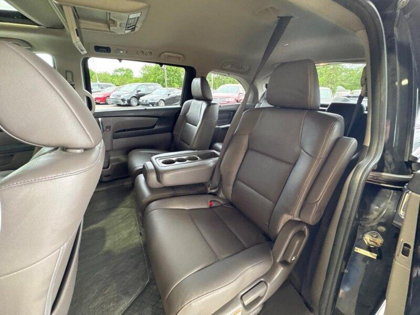 2016 Crystal Black Pearl Honda Odyssey Touring (5FNRL5H95GB) with an 3.5L V6 248hp 250ft. lbs. engine, Automatic transmission, located at 25355 Eames Street, Channahon, IL, 60410, (815) 467-1807, 41.429108, -88.228432 - Introducing the powerhouse on wheels - the 2016 Honda Odyssey Touring! This beast is equipped with a roaring 3.5L V6 engine that cranks out a jaw-dropping 248hp and 250ft. lbs. of torque. Dominating the roads with its sleek design and powerful performance, this van is not to be underestimated. Step - Photo#12