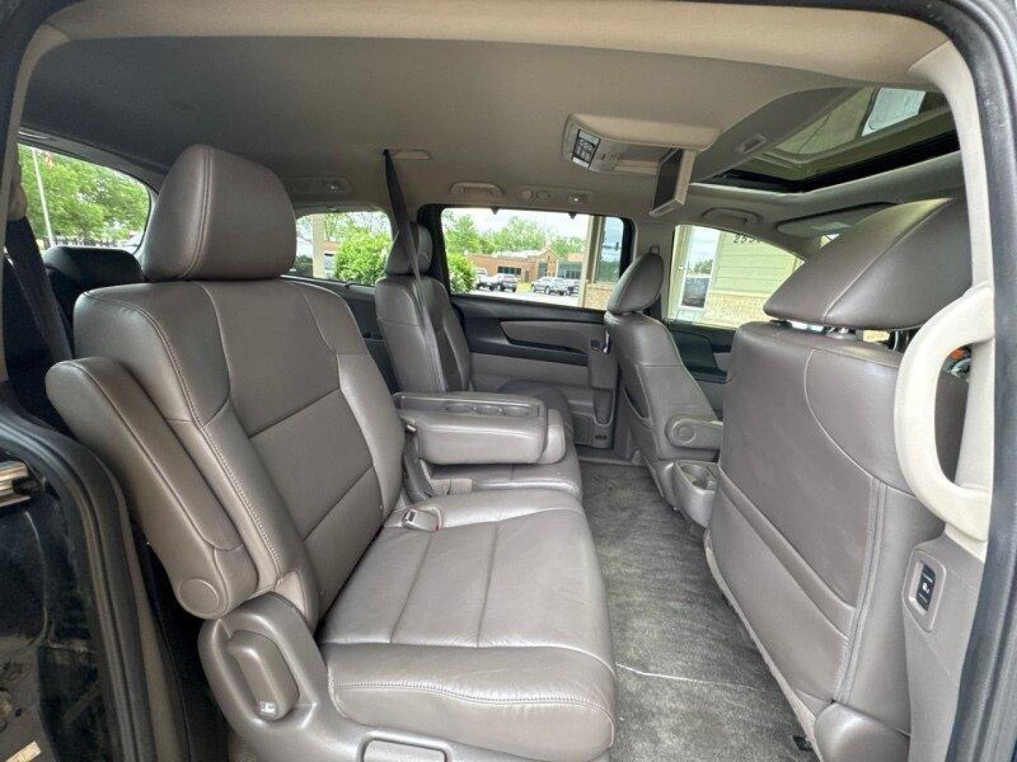 2016 Crystal Black Pearl Honda Odyssey Touring (5FNRL5H95GB) with an 3.5L V6 248hp 250ft. lbs. engine, Automatic transmission, located at 25355 Eames Street, Channahon, IL, 60410, (815) 467-1807, 41.429108, -88.228432 - Introducing the powerhouse on wheels - the 2016 Honda Odyssey Touring! This beast is equipped with a roaring 3.5L V6 engine that cranks out a jaw-dropping 248hp and 250ft. lbs. of torque. Dominating the roads with its sleek design and powerful performance, this van is not to be underestimated. Step - Photo#15