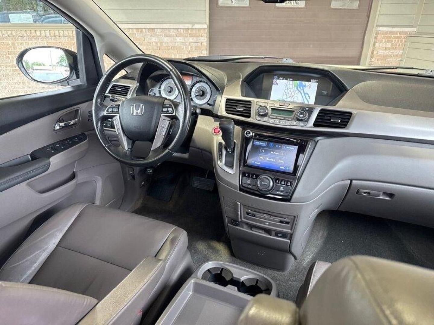 2016 Crystal Black Pearl Honda Odyssey Touring (5FNRL5H95GB) with an 3.5L V6 248hp 250ft. lbs. engine, Automatic transmission, located at 25355 Eames Street, Channahon, IL, 60410, (815) 467-1807, 41.429108, -88.228432 - Introducing the powerhouse on wheels - the 2016 Honda Odyssey Touring! This beast is equipped with a roaring 3.5L V6 engine that cranks out a jaw-dropping 248hp and 250ft. lbs. of torque. Dominating the roads with its sleek design and powerful performance, this van is not to be underestimated. Step - Photo#17