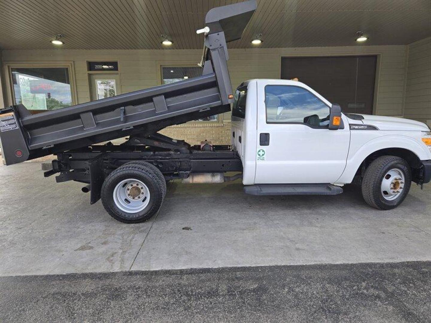 2016 White Ford F-350 XL DRW (1FDRF3G62GE) with an 6.2L Flex Fuel V8 385hp 405ft. lbs. engine, Automatic transmission, located at 25355 Eames Street, Channahon, IL, 60410, (815) 467-1807, 41.429108, -88.228432 - ** 9 FOOT RUGBY DUMP BODY, FULLY SERVICED AND READY TO WORK. **This 2016 Ford F-350 Super Duty XL is a robust truck designed to handle tough tasks with ease. Powered by a 6.2L Flex Fuel V8 engine delivering 385hp and 405ft. lbs. of torque, this truck is ready for any challenge. The exterior is a cri - Photo#2