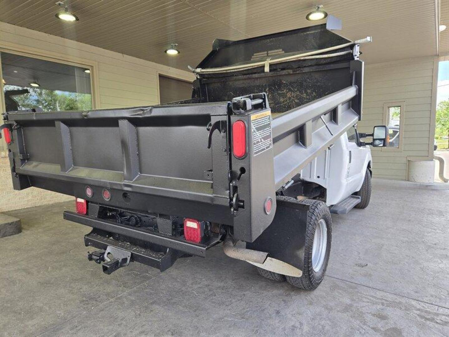 2016 White Ford F-350 XL DRW (1FDRF3G62GE) with an 6.2L Flex Fuel V8 385hp 405ft. lbs. engine, Automatic transmission, located at 25355 Eames Street, Channahon, IL, 60410, (815) 467-1807, 41.429108, -88.228432 - ** 9 FOOT RUGBY DUMP BODY, FULLY SERVICED AND READY TO WORK. **This 2016 Ford F-350 Super Duty XL is a robust truck designed to handle tough tasks with ease. Powered by a 6.2L Flex Fuel V8 engine delivering 385hp and 405ft. lbs. of torque, this truck is ready for any challenge. The exterior is a cri - Photo#4