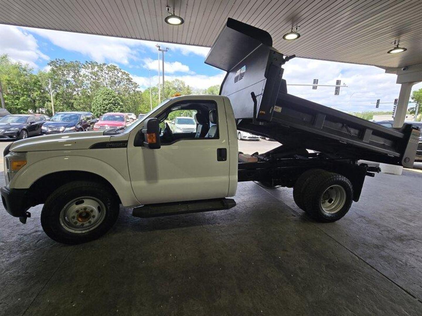 2016 White Ford F-350 XL DRW (1FDRF3G62GE) with an 6.2L Flex Fuel V8 385hp 405ft. lbs. engine, Automatic transmission, located at 25355 Eames Street, Channahon, IL, 60410, (815) 467-1807, 41.429108, -88.228432 - ** 9 FOOT RUGBY DUMP BODY, FULLY SERVICED AND READY TO WORK. **This 2016 Ford F-350 Super Duty XL is a robust truck designed to handle tough tasks with ease. Powered by a 6.2L Flex Fuel V8 engine delivering 385hp and 405ft. lbs. of torque, this truck is ready for any challenge. The exterior is a cri - Photo#8