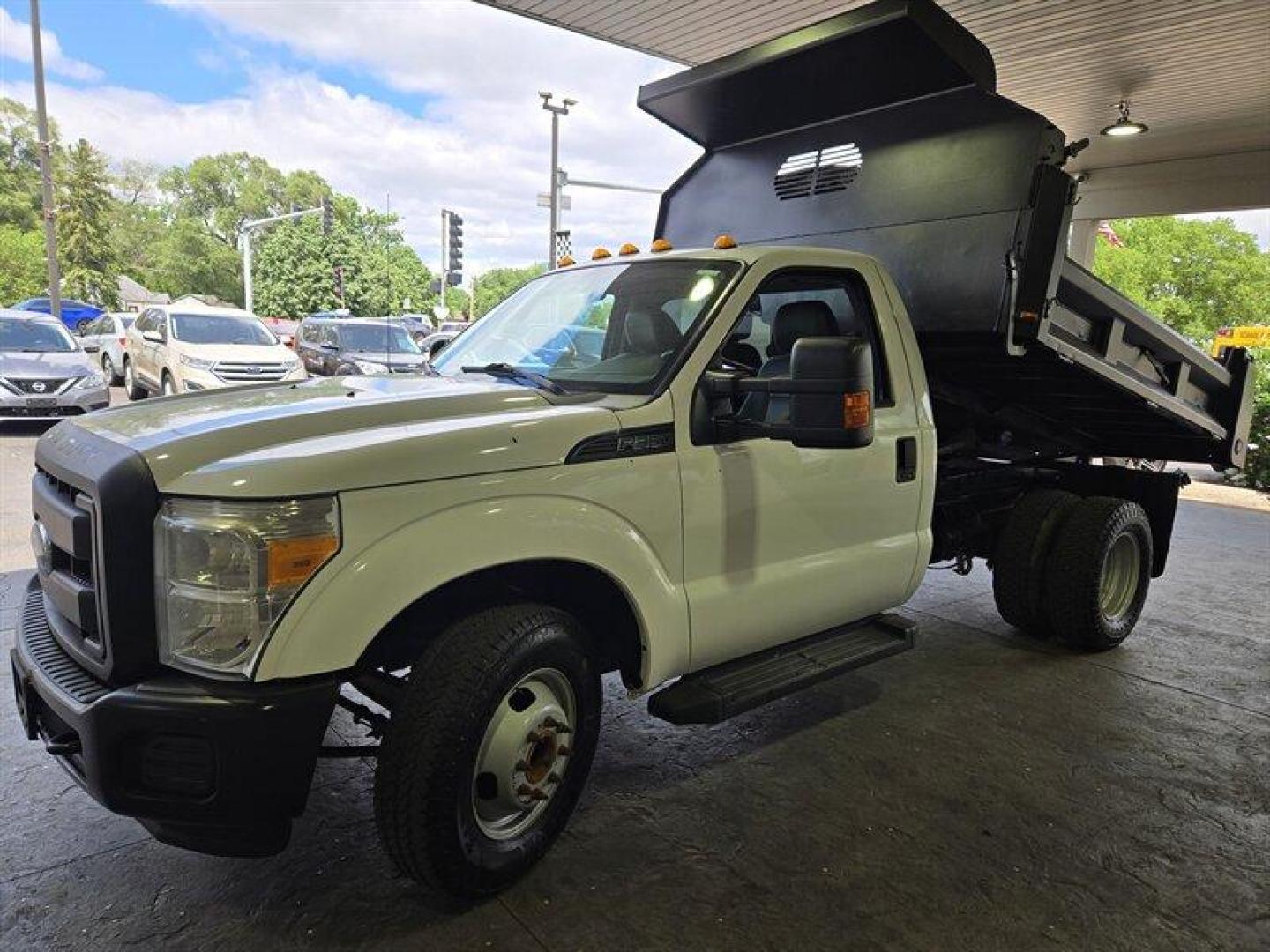 2016 White Ford F-350 XL DRW (1FDRF3G62GE) with an 6.2L Flex Fuel V8 385hp 405ft. lbs. engine, Automatic transmission, located at 25355 Eames Street, Channahon, IL, 60410, (815) 467-1807, 41.429108, -88.228432 - ** 9 FOOT RUGBY DUMP BODY, FULLY SERVICED AND READY TO WORK. **This 2016 Ford F-350 Super Duty XL is a robust truck designed to handle tough tasks with ease. Powered by a 6.2L Flex Fuel V8 engine delivering 385hp and 405ft. lbs. of torque, this truck is ready for any challenge. The exterior is a cri - Photo#9