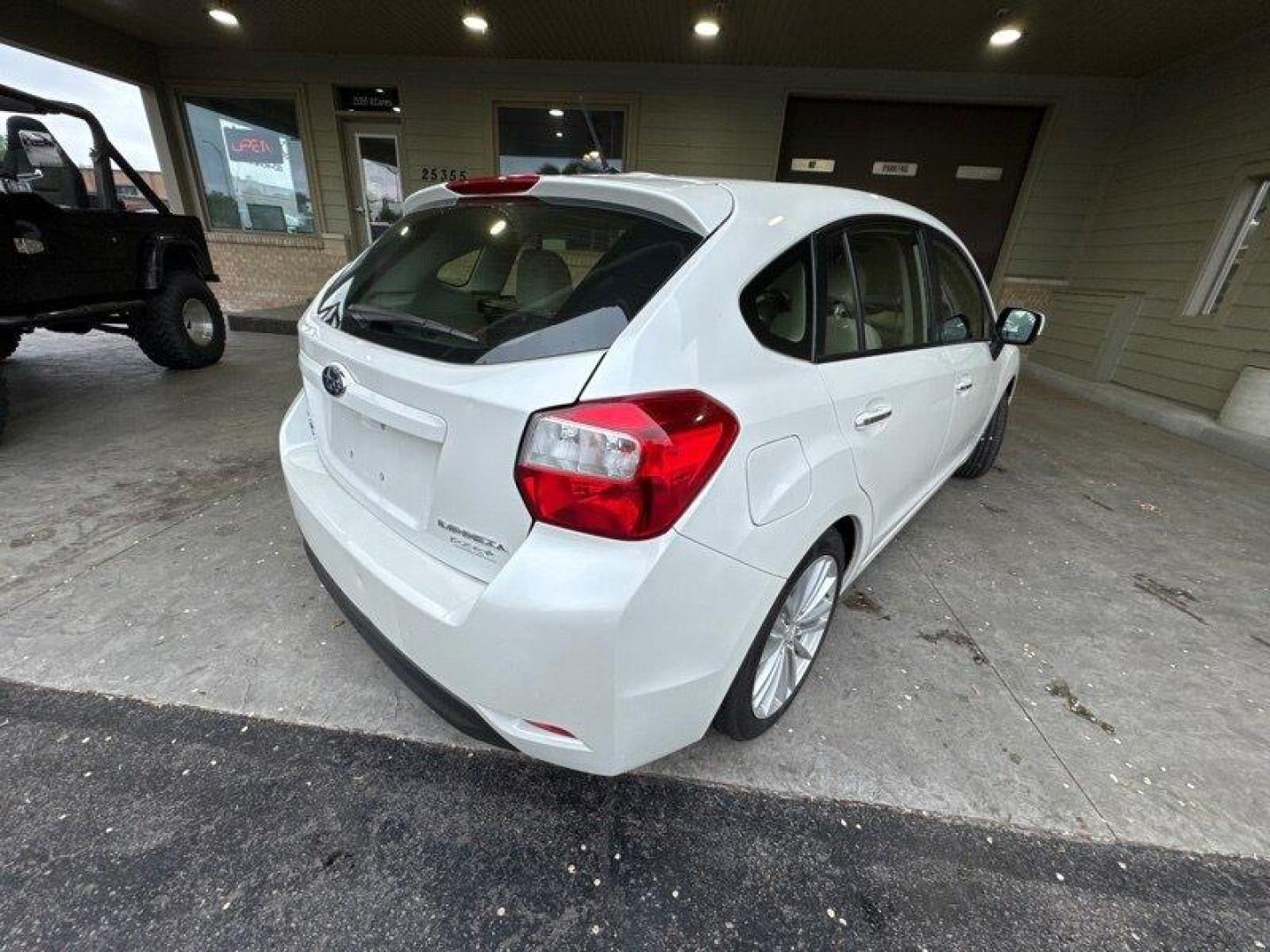 2013 Satin White Pearl Subaru Impreza 2.0i Limited (JF1GPAH65D2) with an 2.0L H4 148hp 145ft. lbs. engine, Automatic transmission, located at 25355 Eames Street, Channahon, IL, 60410, (815) 467-1807, 41.429108, -88.228432 - Looking for a reliable and efficient ride? Check out this 2013 Subaru Impreza 2.0i Limited! With a 2.0L H4 engine delivering 148hp and 145ft. lbs. of torque, this compact car packs a punch while remaining fuel-efficient. The factory default features of this Impreza are sure to impress. Enjoy the co - Photo#3