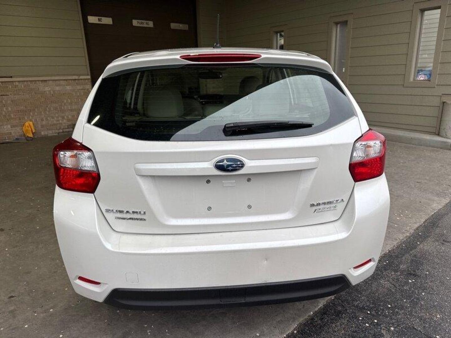 2013 Satin White Pearl Subaru Impreza 2.0i Limited (JF1GPAH65D2) with an 2.0L H4 148hp 145ft. lbs. engine, Automatic transmission, located at 25355 Eames Street, Channahon, IL, 60410, (815) 467-1807, 41.429108, -88.228432 - Looking for a reliable and efficient ride? Check out this 2013 Subaru Impreza 2.0i Limited! With a 2.0L H4 engine delivering 148hp and 145ft. lbs. of torque, this compact car packs a punch while remaining fuel-efficient. The factory default features of this Impreza are sure to impress. Enjoy the co - Photo#4