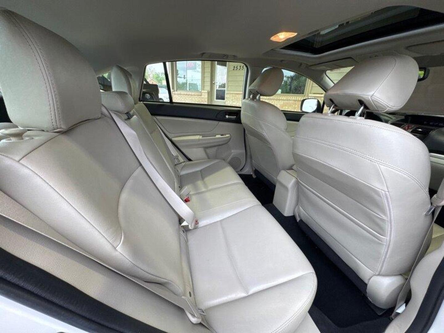 2013 Satin White Pearl Subaru Impreza 2.0i Limited (JF1GPAH65D2) with an 2.0L H4 148hp 145ft. lbs. engine, Automatic transmission, located at 25355 Eames Street, Channahon, IL, 60410, (815) 467-1807, 41.429108, -88.228432 - Looking for a reliable and efficient ride? Check out this 2013 Subaru Impreza 2.0i Limited! With a 2.0L H4 engine delivering 148hp and 145ft. lbs. of torque, this compact car packs a punch while remaining fuel-efficient. The factory default features of this Impreza are sure to impress. Enjoy the co - Photo#16