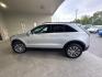 2019 Radiant Silver Metallic Cadillac XT4 Sport (1GYFZFR4XKF) with an 2.0L Turbo I4 237hp 258ft. lbs. engine, Automatic transmission, located at 25355 Eames Street, Channahon, IL, 60410, (815) 467-1807, 41.429108, -88.228432 - Introducing the sleek and stylish 2019 Cadillac XT4 Sport in the eye-catching Radiant Silver Metallic exterior color! This beauty is powered by a robust 2.0L Turbo I4 engine, delivering 237hp and 258ft. lbs. of torque for a thrilling driving experience. Step inside the luxurious Light Wheat/Jet Bla - Photo#6