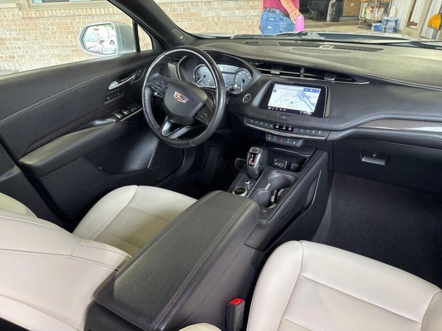 2019 Radiant Silver Metallic Cadillac XT4 Sport (1GYFZFR4XKF) with an 2.0L Turbo I4 237hp 258ft. lbs. engine, Automatic transmission, located at 25355 Eames Street, Channahon, IL, 60410, (815) 467-1807, 41.429108, -88.228432 - Introducing the sleek and stylish 2019 Cadillac XT4 Sport in the eye-catching Radiant Silver Metallic exterior color! This beauty is powered by a robust 2.0L Turbo I4 engine, delivering 237hp and 258ft. lbs. of torque for a thrilling driving experience. Step inside the luxurious Light Wheat/Jet Bla - Photo#18