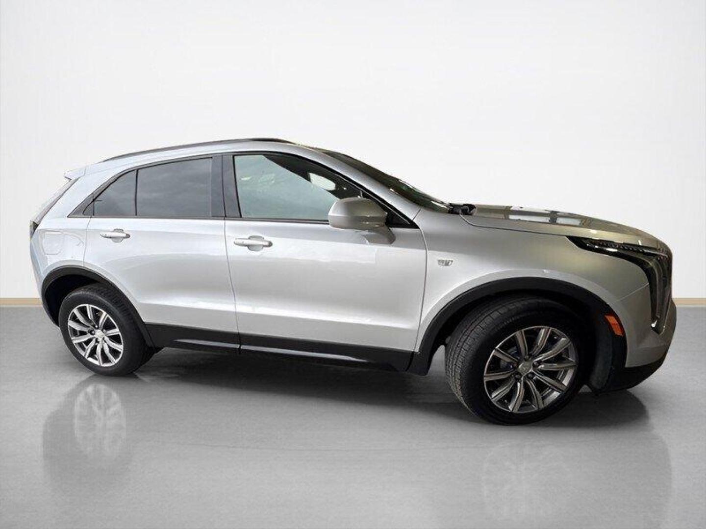 2019 Radiant Silver Metallic Cadillac XT4 Sport (1GYFZFR4XKF) with an 2.0L Turbo I4 237hp 258ft. lbs. engine, Automatic transmission, located at 25355 Eames Street, Channahon, IL, 60410, (815) 467-1807, 41.429108, -88.228432 - Introducing the sleek and stylish 2019 Cadillac XT4 Sport in the eye-catching Radiant Silver Metallic exterior color! This beauty is powered by a robust 2.0L Turbo I4 engine, delivering 237hp and 258ft. lbs. of torque for a thrilling driving experience. Step inside the luxurious Light Wheat/Jet Bla - Photo#1