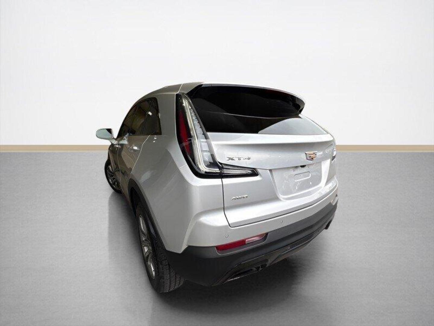 2019 Radiant Silver Metallic Cadillac XT4 Sport (1GYFZFR4XKF) with an 2.0L Turbo I4 237hp 258ft. lbs. engine, Automatic transmission, located at 25355 Eames Street, Channahon, IL, 60410, (815) 467-1807, 41.429108, -88.228432 - Introducing the sleek and stylish 2019 Cadillac XT4 Sport in the eye-catching Radiant Silver Metallic exterior color! This beauty is powered by a robust 2.0L Turbo I4 engine, delivering 237hp and 258ft. lbs. of torque for a thrilling driving experience. Step inside the luxurious Light Wheat/Jet Bla - Photo#4