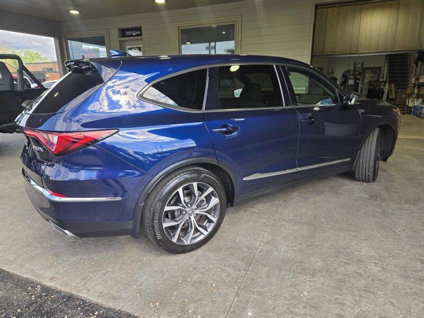 2023 Fathom Blue Pearl Acura MDX Technology (5J8YD9H44PL) with an 3.5L V6 290hp 267ft. lbs. engine, Automatic transmission, located at 25355 Eames Street, Channahon, IL, 60410, (815) 467-1807, 41.429108, -88.228432 - Introducing the stunning 2023 Acura MDX w/Tech in the captivating Fathom Blue Pearl exterior paired with a luxurious Espresso interior! This powerhouse is equipped with a robust 3.5L V6 engine delivering 290hp and 267ft. lbs. of torque, ensuring a thrilling driving experience every time you hit the - Photo#4