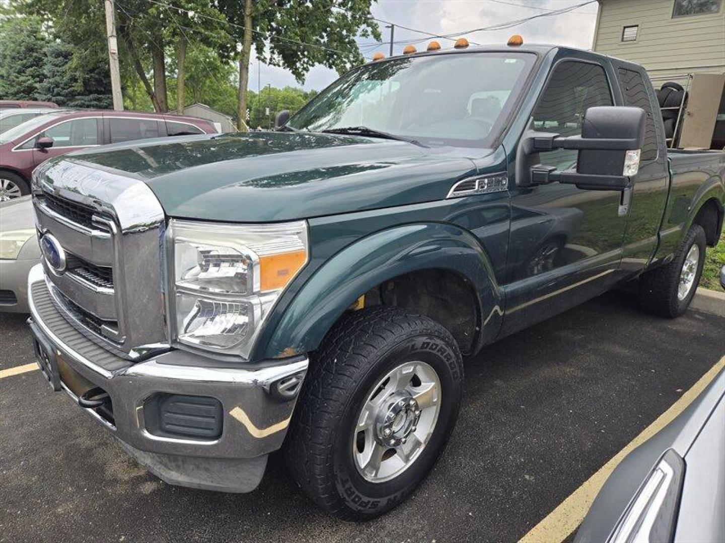 2012 Green Gem Metallic Ford F-250 XLT (1FT7X2B6XCE) with an 6.2L Flex Fuel V8 385hp 405ft. lbs. engine, Automatic transmission, located at 25355 Eames Street, Channahon, IL, 60410, (815) 467-1807, 41.429108, -88.228432 - ** TRADE IN WHOLESALE SPECIAL, HAS DAMAGE AND IS RUSTY BUT HAS LOW MILES AND NO WARNING LIGHTS ON THE DASH. SOLD AS-IS WE ARE NOT INSPECTING SO DO NOT KNOW WHAT IT MAY NEED MECHANICALLY. ** - Photo#0
