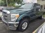 2012 Green Gem Metallic Ford F-250 XLT (1FT7X2B6XCE) with an 6.2L Flex Fuel V8 385hp 405ft. lbs. engine, Automatic transmission, located at 25355 Eames Street, Channahon, IL, 60410, (815) 467-1807, 41.429108, -88.228432 - ** TRADE IN WHOLESALE SPECIAL, HAS DAMAGE AND IS RUSTY BUT HAS LOW MILES AND NO WARNING LIGHTS ON THE DASH. SOLD AS-IS WE ARE NOT INSPECTING SO DO NOT KNOW WHAT IT MAY NEED MECHANICALLY. ** - Photo#0