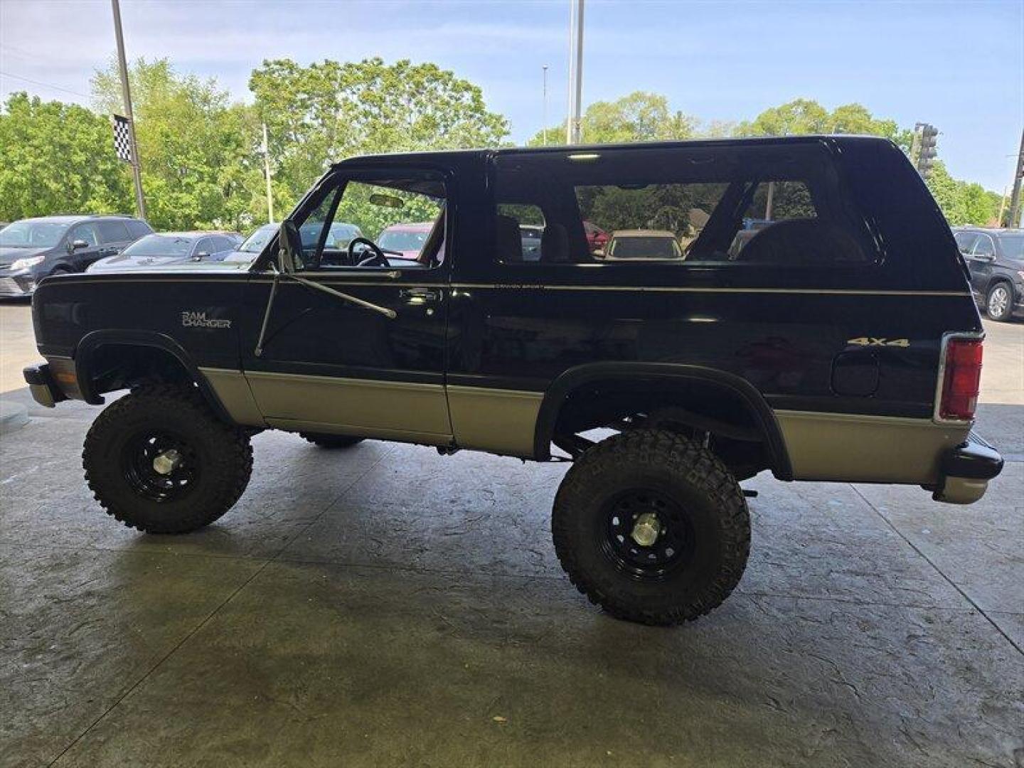 1992 Black Dodge Ramcharger CANYON SPORT (3B4GM17Z7NM) with an 5.9 engine, Automatic transmission, located at 25355 Eames Street, Channahon, IL, 60410, (815) 467-1807, 41.429108, -88.228432 - Presenting the 1992 Dodge Ramcharger CANYON SPORT. Equipped with a robust 5.9 engine, this classic vehicle boasts a range of factory default features that ensure a smooth and reliable driving experience. The exterior is finished in a sleek Black color, complemented by a warm Tan interior. With milea - Photo#6