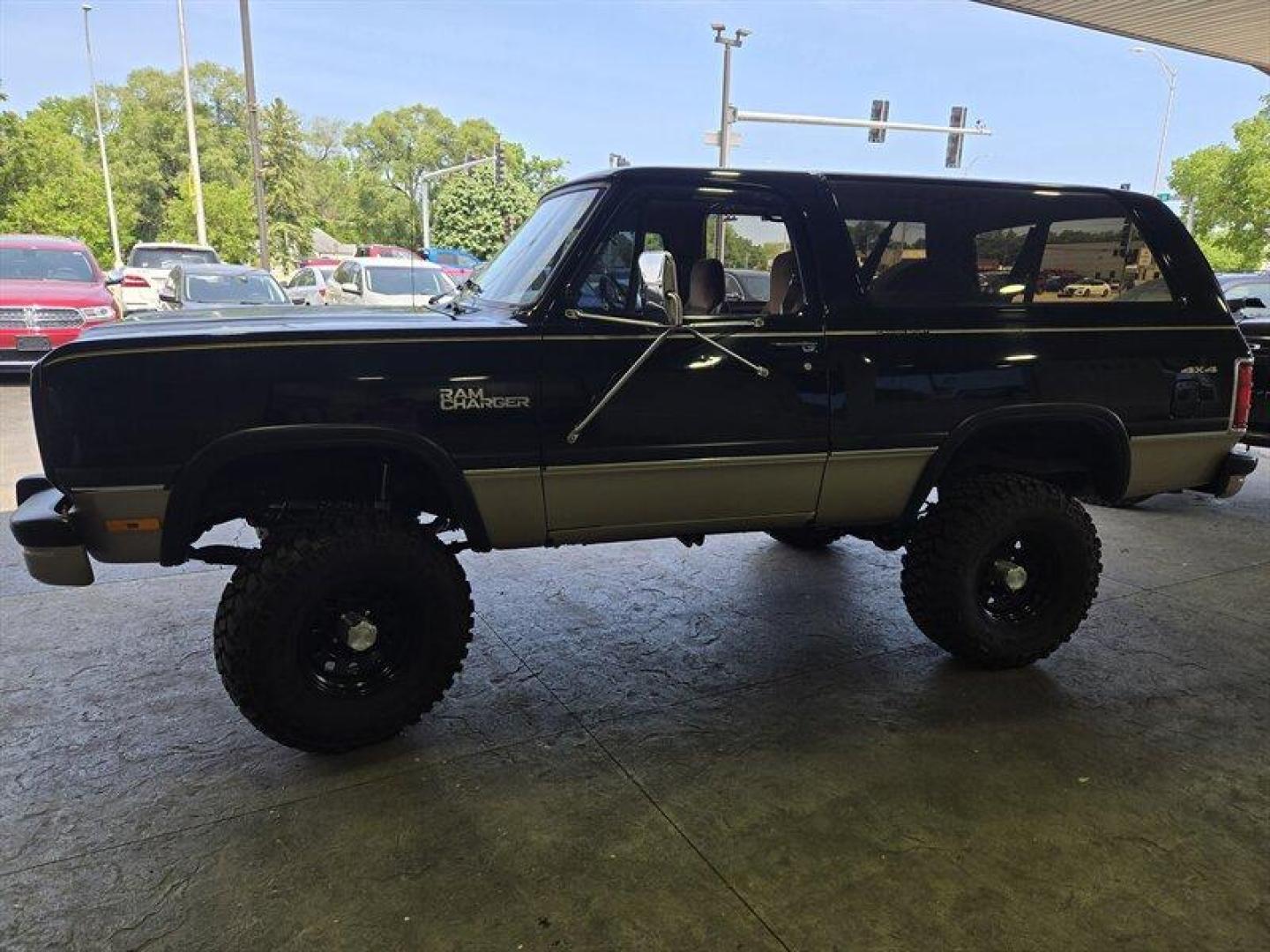 1992 Black Dodge Ramcharger CANYON SPORT (3B4GM17Z7NM) with an 5.9 engine, Automatic transmission, located at 25355 Eames Street, Channahon, IL, 60410, (815) 467-1807, 41.429108, -88.228432 - Presenting the 1992 Dodge Ramcharger CANYON SPORT. Equipped with a robust 5.9 engine, this classic vehicle boasts a range of factory default features that ensure a smooth and reliable driving experience. The exterior is finished in a sleek Black color, complemented by a warm Tan interior. With milea - Photo#7