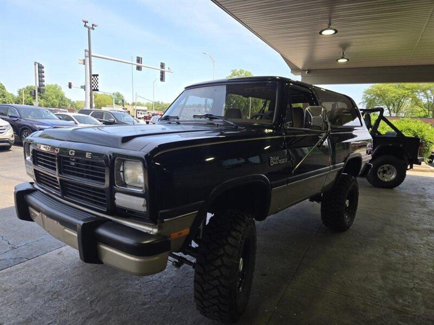 1992 Black Dodge Ramcharger CANYON SPORT (3B4GM17Z7NM) with an 5.9 engine, Automatic transmission, located at 25355 Eames Street, Channahon, IL, 60410, (815) 467-1807, 41.429108, -88.228432 - Presenting the 1992 Dodge Ramcharger CANYON SPORT. Equipped with a robust 5.9 engine, this classic vehicle boasts a range of factory default features that ensure a smooth and reliable driving experience. The exterior is finished in a sleek Black color, complemented by a warm Tan interior. With milea - Photo#8