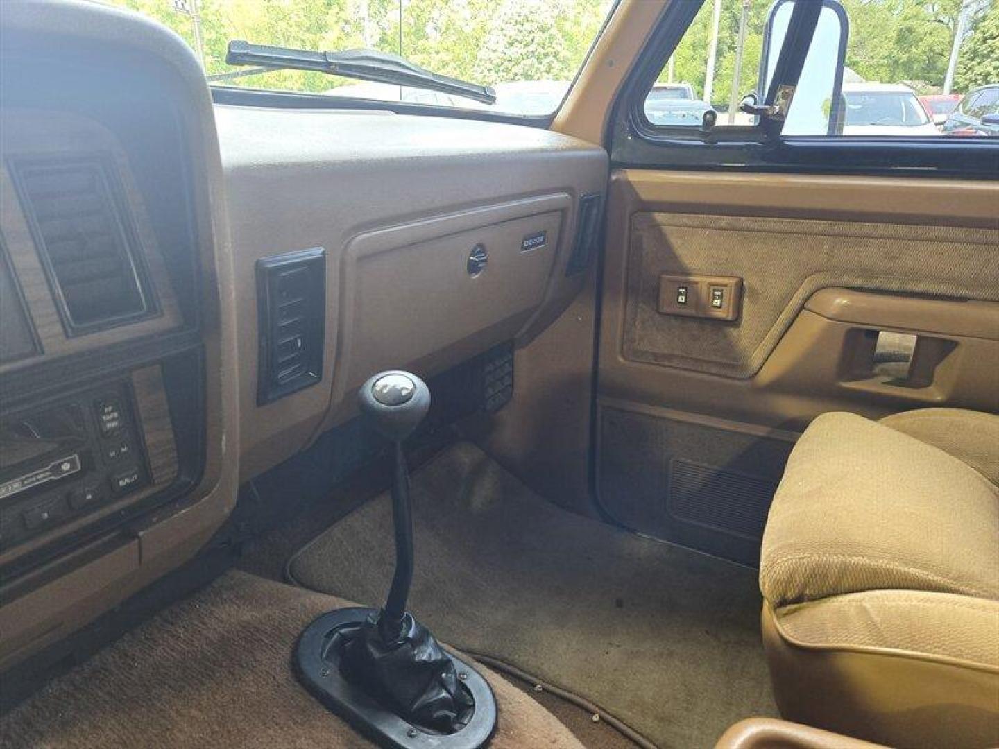 1992 Black Dodge Ramcharger CANYON SPORT (3B4GM17Z7NM) with an 5.9 engine, Automatic transmission, located at 25355 Eames Street, Channahon, IL, 60410, (815) 467-1807, 41.429108, -88.228432 - Presenting the 1992 Dodge Ramcharger CANYON SPORT. Equipped with a robust 5.9 engine, this classic vehicle boasts a range of factory default features that ensure a smooth and reliable driving experience. The exterior is finished in a sleek Black color, complemented by a warm Tan interior. With milea - Photo#18