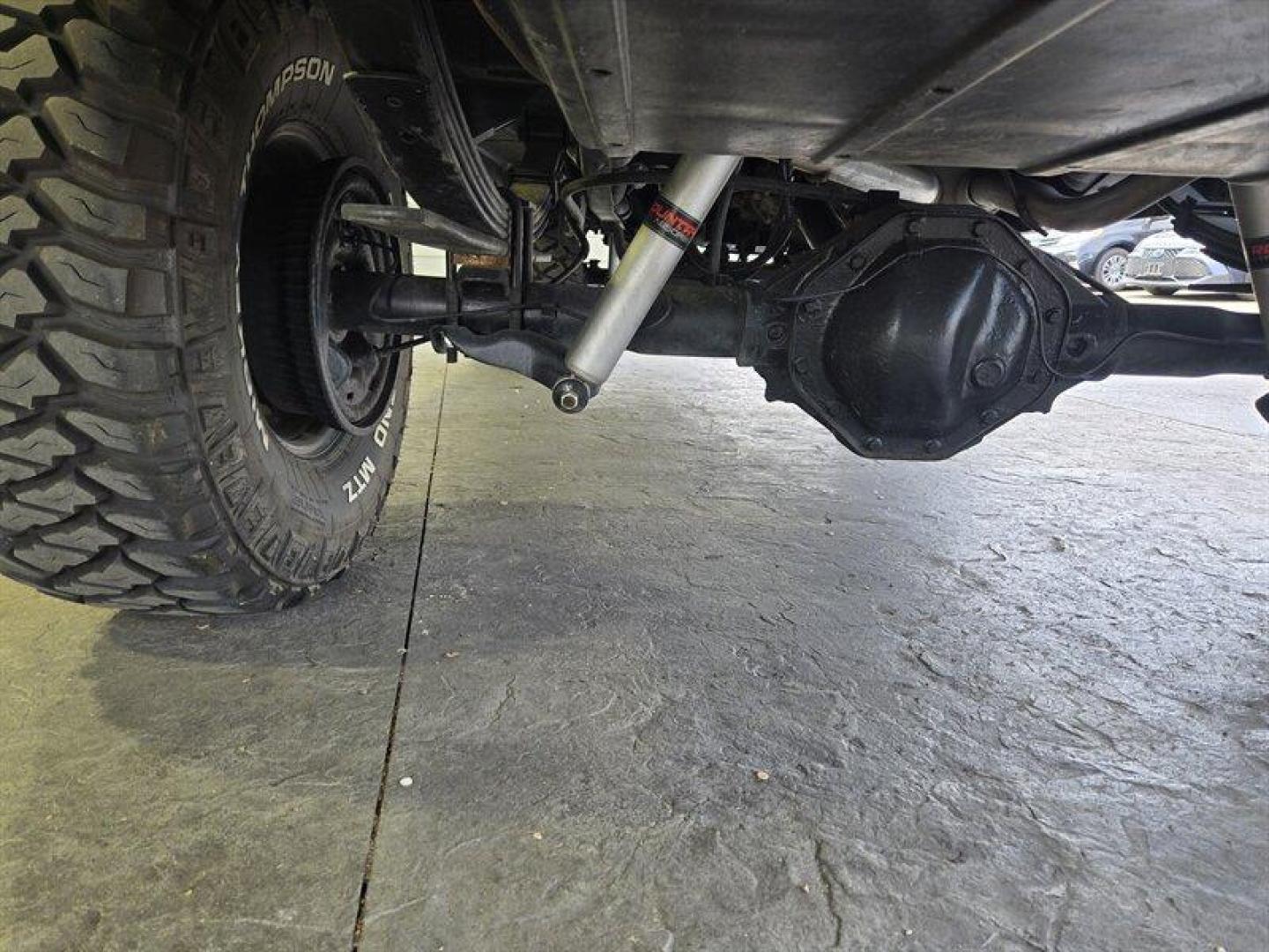 1992 Black Dodge Ramcharger CANYON SPORT (3B4GM17Z7NM) with an 5.9 engine, Automatic transmission, located at 25355 Eames Street, Channahon, IL, 60410, (815) 467-1807, 41.429108, -88.228432 - Presenting the 1992 Dodge Ramcharger CANYON SPORT. Equipped with a robust 5.9 engine, this classic vehicle boasts a range of factory default features that ensure a smooth and reliable driving experience. The exterior is finished in a sleek Black color, complemented by a warm Tan interior. With milea - Photo#32