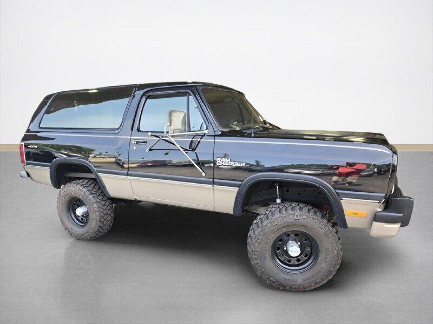 1992 Black Dodge Ramcharger CANYON SPORT (3B4GM17Z7NM) with an 5.9 engine, Automatic transmission, located at 25355 Eames Street, Channahon, IL, 60410, (815) 467-1807, 41.429108, -88.228432 - Presenting the 1992 Dodge Ramcharger CANYON SPORT. Equipped with a robust 5.9 engine, this classic vehicle boasts a range of factory default features that ensure a smooth and reliable driving experience. The exterior is finished in a sleek Black color, complemented by a warm Tan interior. With milea - Photo#1