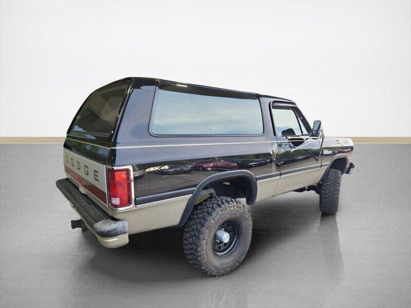 1992 Black Dodge Ramcharger CANYON SPORT (3B4GM17Z7NM) with an 5.9 engine, Automatic transmission, located at 25355 Eames Street, Channahon, IL, 60410, (815) 467-1807, 41.429108, -88.228432 - Presenting the 1992 Dodge Ramcharger CANYON SPORT. Equipped with a robust 5.9 engine, this classic vehicle boasts a range of factory default features that ensure a smooth and reliable driving experience. The exterior is finished in a sleek Black color, complemented by a warm Tan interior. With milea - Photo#3