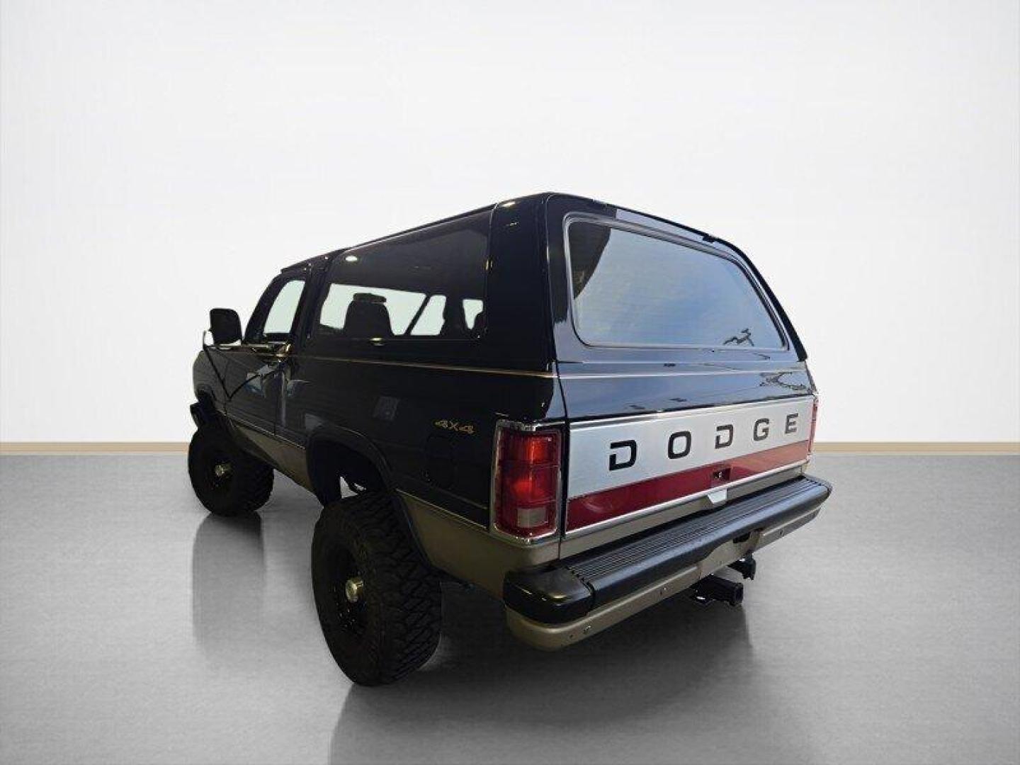 1992 Black Dodge Ramcharger CANYON SPORT (3B4GM17Z7NM) with an 5.9 engine, Automatic transmission, located at 25355 Eames Street, Channahon, IL, 60410, (815) 467-1807, 41.429108, -88.228432 - Presenting the 1992 Dodge Ramcharger CANYON SPORT. Equipped with a robust 5.9 engine, this classic vehicle boasts a range of factory default features that ensure a smooth and reliable driving experience. The exterior is finished in a sleek Black color, complemented by a warm Tan interior. With milea - Photo#5