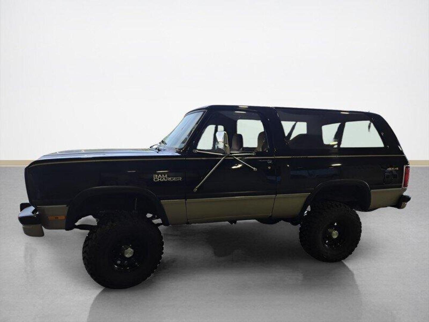1992 Black Dodge Ramcharger CANYON SPORT (3B4GM17Z7NM) with an 5.9 engine, Automatic transmission, located at 25355 Eames Street, Channahon, IL, 60410, (815) 467-1807, 41.429108, -88.228432 - Presenting the 1992 Dodge Ramcharger CANYON SPORT. Equipped with a robust 5.9 engine, this classic vehicle boasts a range of factory default features that ensure a smooth and reliable driving experience. The exterior is finished in a sleek Black color, complemented by a warm Tan interior. With milea - Photo#7