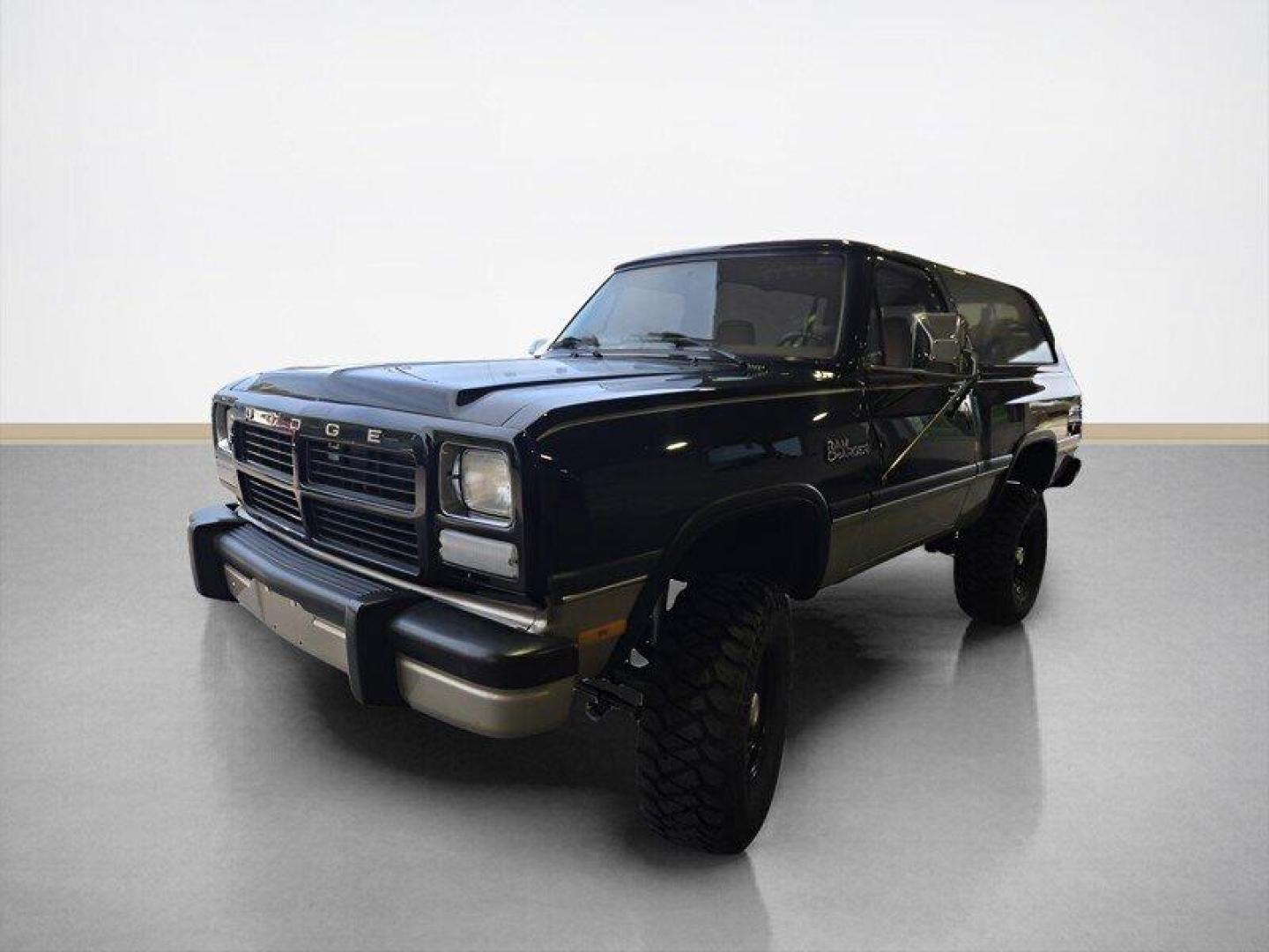 1992 Black Dodge Ramcharger CANYON SPORT (3B4GM17Z7NM) with an 5.9 engine, Automatic transmission, located at 25355 Eames Street, Channahon, IL, 60410, (815) 467-1807, 41.429108, -88.228432 - Presenting the 1992 Dodge Ramcharger CANYON SPORT. Equipped with a robust 5.9 engine, this classic vehicle boasts a range of factory default features that ensure a smooth and reliable driving experience. The exterior is finished in a sleek Black color, complemented by a warm Tan interior. With milea - Photo#8