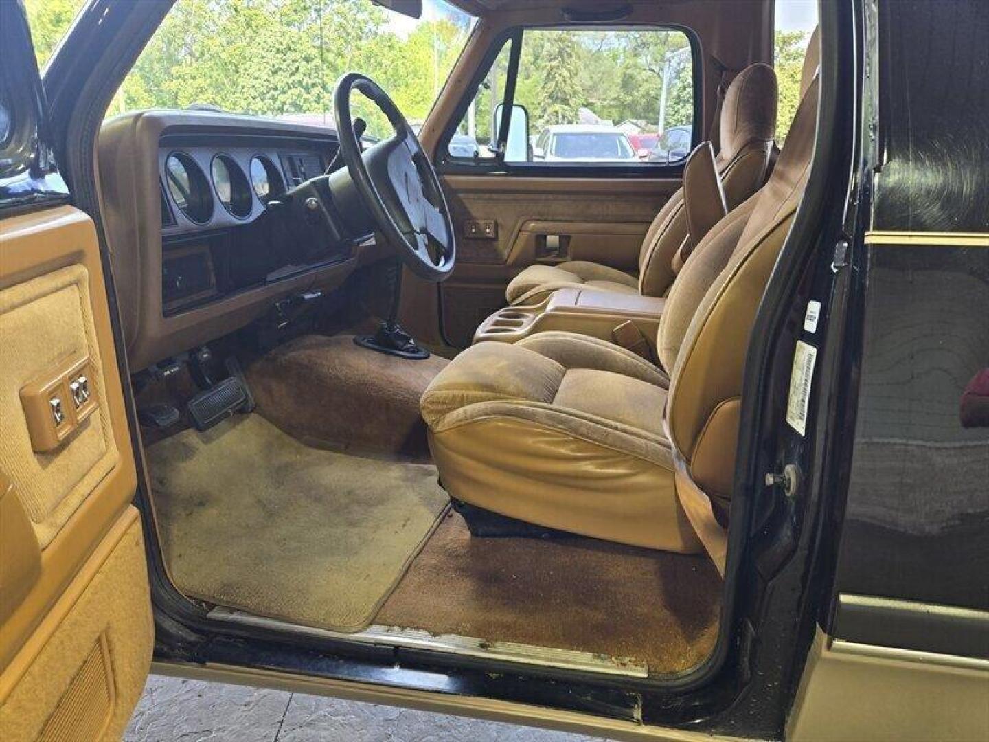 1992 Black Dodge Ramcharger CANYON SPORT (3B4GM17Z7NM) with an 5.9 engine, Automatic transmission, located at 25355 Eames Street, Channahon, IL, 60410, (815) 467-1807, 41.429108, -88.228432 - Presenting the 1992 Dodge Ramcharger CANYON SPORT. Equipped with a robust 5.9 engine, this classic vehicle boasts a range of factory default features that ensure a smooth and reliable driving experience. The exterior is finished in a sleek Black color, complemented by a warm Tan interior. With milea - Photo#10