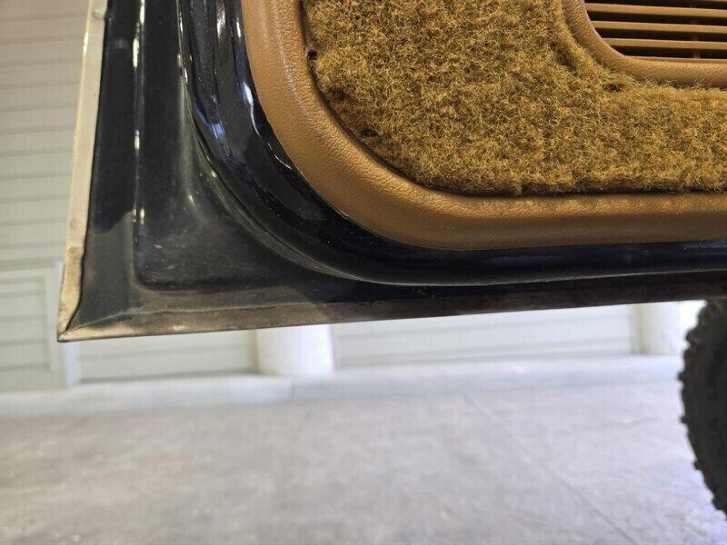 1992 Black Dodge Ramcharger CANYON SPORT (3B4GM17Z7NM) with an 5.9 engine, Automatic transmission, located at 25355 Eames Street, Channahon, IL, 60410, (815) 467-1807, 41.429108, -88.228432 - Presenting the 1992 Dodge Ramcharger CANYON SPORT. Equipped with a robust 5.9 engine, this classic vehicle boasts a range of factory default features that ensure a smooth and reliable driving experience. The exterior is finished in a sleek Black color, complemented by a warm Tan interior. With milea - Photo#12