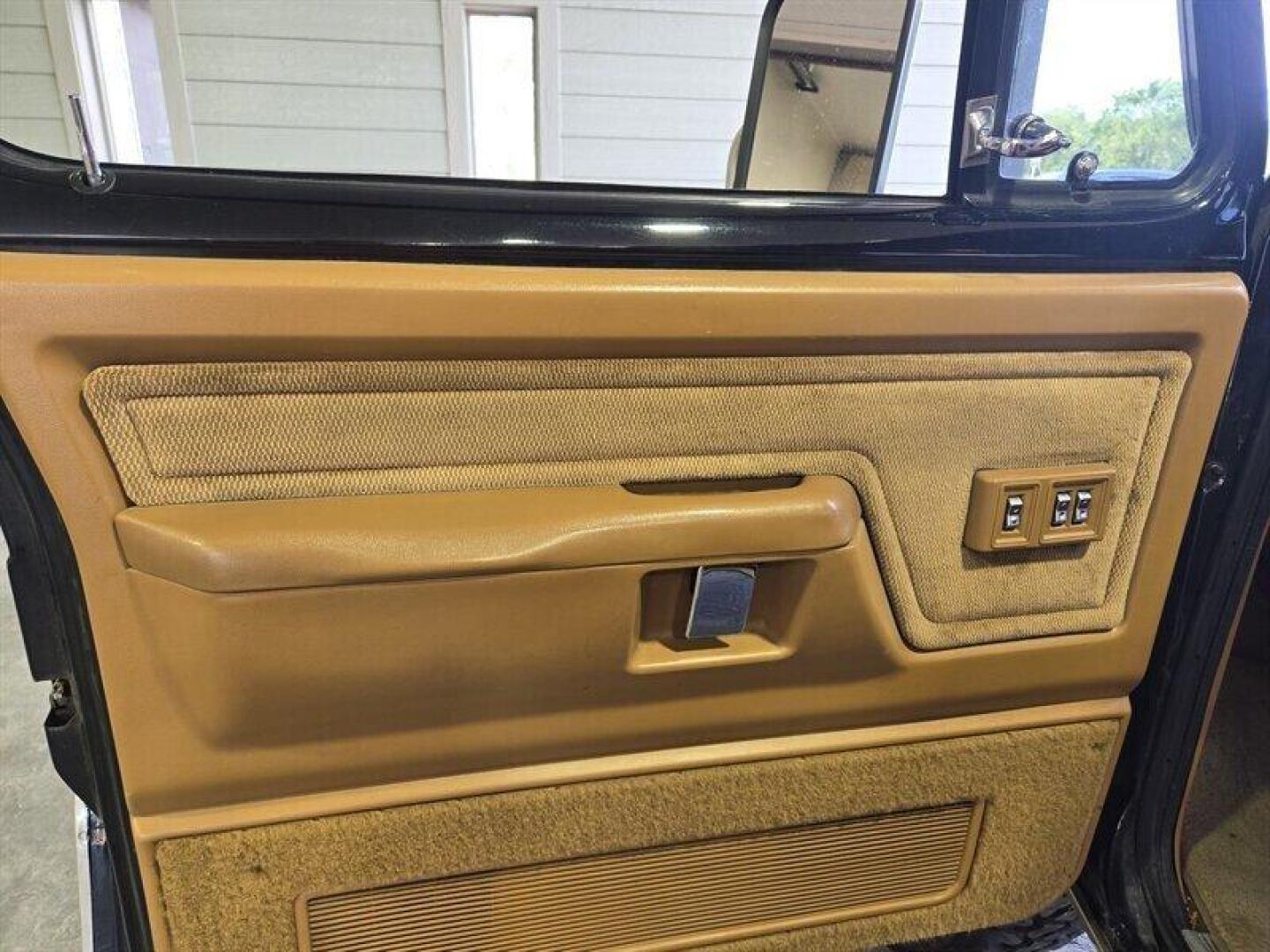 1992 Black Dodge Ramcharger CANYON SPORT (3B4GM17Z7NM) with an 5.9 engine, Automatic transmission, located at 25355 Eames Street, Channahon, IL, 60410, (815) 467-1807, 41.429108, -88.228432 - Presenting the 1992 Dodge Ramcharger CANYON SPORT. Equipped with a robust 5.9 engine, this classic vehicle boasts a range of factory default features that ensure a smooth and reliable driving experience. The exterior is finished in a sleek Black color, complemented by a warm Tan interior. With milea - Photo#13