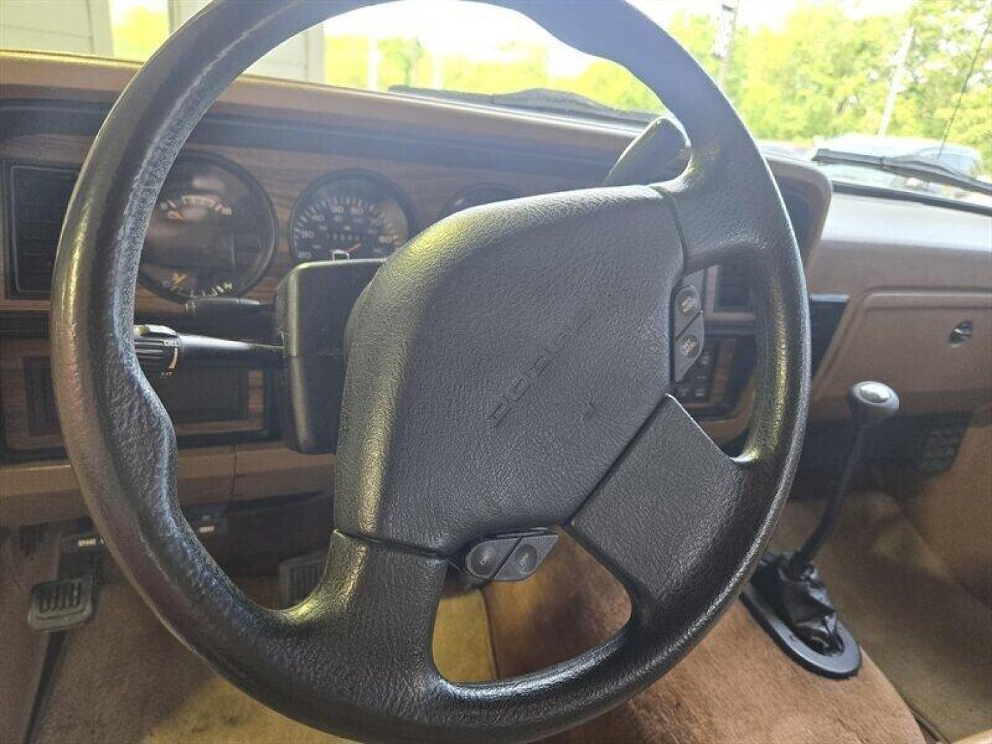 1992 Black Dodge Ramcharger CANYON SPORT (3B4GM17Z7NM) with an 5.9 engine, Automatic transmission, located at 25355 Eames Street, Channahon, IL, 60410, (815) 467-1807, 41.429108, -88.228432 - Presenting the 1992 Dodge Ramcharger CANYON SPORT. Equipped with a robust 5.9 engine, this classic vehicle boasts a range of factory default features that ensure a smooth and reliable driving experience. The exterior is finished in a sleek Black color, complemented by a warm Tan interior. With milea - Photo#16