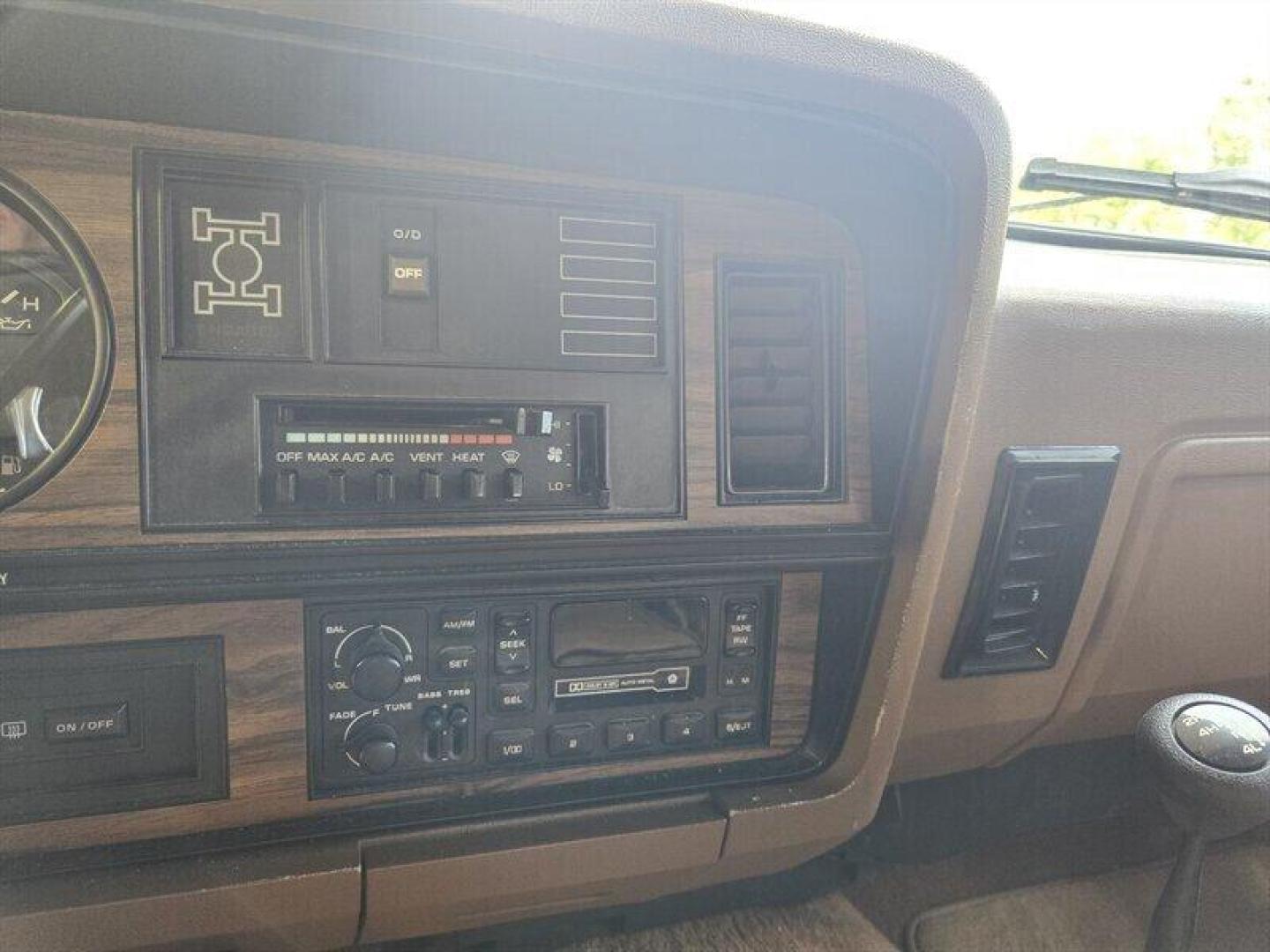 1992 Black Dodge Ramcharger CANYON SPORT (3B4GM17Z7NM) with an 5.9 engine, Automatic transmission, located at 25355 Eames Street, Channahon, IL, 60410, (815) 467-1807, 41.429108, -88.228432 - Presenting the 1992 Dodge Ramcharger CANYON SPORT. Equipped with a robust 5.9 engine, this classic vehicle boasts a range of factory default features that ensure a smooth and reliable driving experience. The exterior is finished in a sleek Black color, complemented by a warm Tan interior. With milea - Photo#17