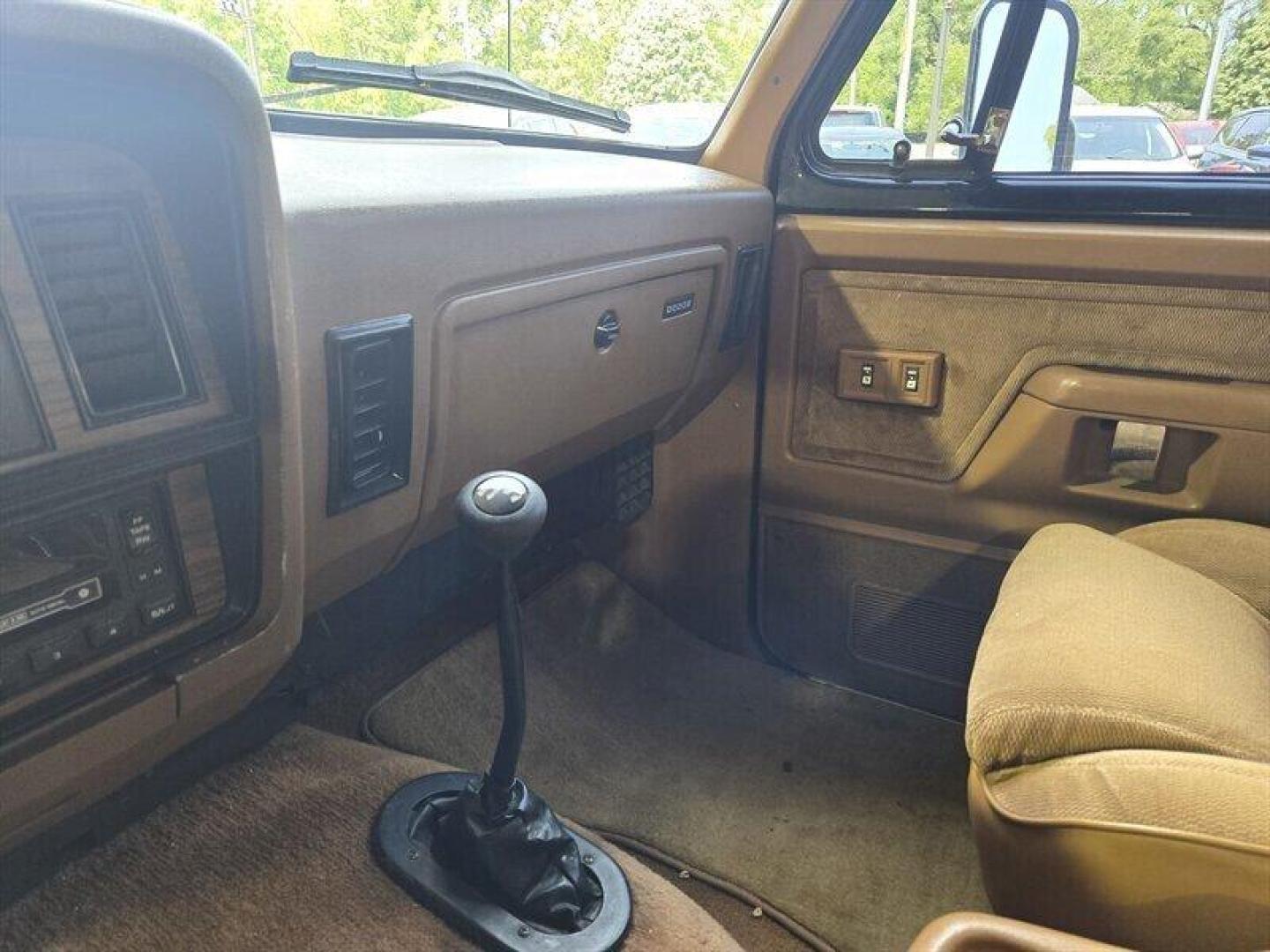 1992 Black Dodge Ramcharger CANYON SPORT (3B4GM17Z7NM) with an 5.9 engine, Automatic transmission, located at 25355 Eames Street, Channahon, IL, 60410, (815) 467-1807, 41.429108, -88.228432 - Presenting the 1992 Dodge Ramcharger CANYON SPORT. Equipped with a robust 5.9 engine, this classic vehicle boasts a range of factory default features that ensure a smooth and reliable driving experience. The exterior is finished in a sleek Black color, complemented by a warm Tan interior. With milea - Photo#18