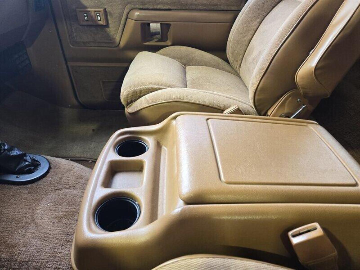 1992 Black Dodge Ramcharger CANYON SPORT (3B4GM17Z7NM) with an 5.9 engine, Automatic transmission, located at 25355 Eames Street, Channahon, IL, 60410, (815) 467-1807, 41.429108, -88.228432 - Presenting the 1992 Dodge Ramcharger CANYON SPORT. Equipped with a robust 5.9 engine, this classic vehicle boasts a range of factory default features that ensure a smooth and reliable driving experience. The exterior is finished in a sleek Black color, complemented by a warm Tan interior. With milea - Photo#19