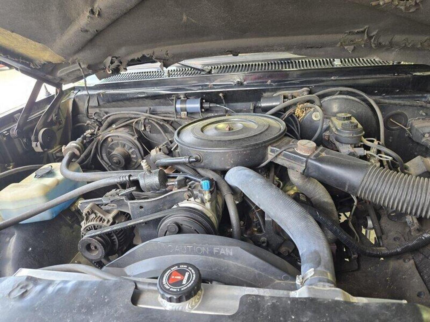 1992 Black Dodge Ramcharger CANYON SPORT (3B4GM17Z7NM) with an 5.9 engine, Automatic transmission, located at 25355 Eames Street, Channahon, IL, 60410, (815) 467-1807, 41.429108, -88.228432 - Presenting the 1992 Dodge Ramcharger CANYON SPORT. Equipped with a robust 5.9 engine, this classic vehicle boasts a range of factory default features that ensure a smooth and reliable driving experience. The exterior is finished in a sleek Black color, complemented by a warm Tan interior. With milea - Photo#26