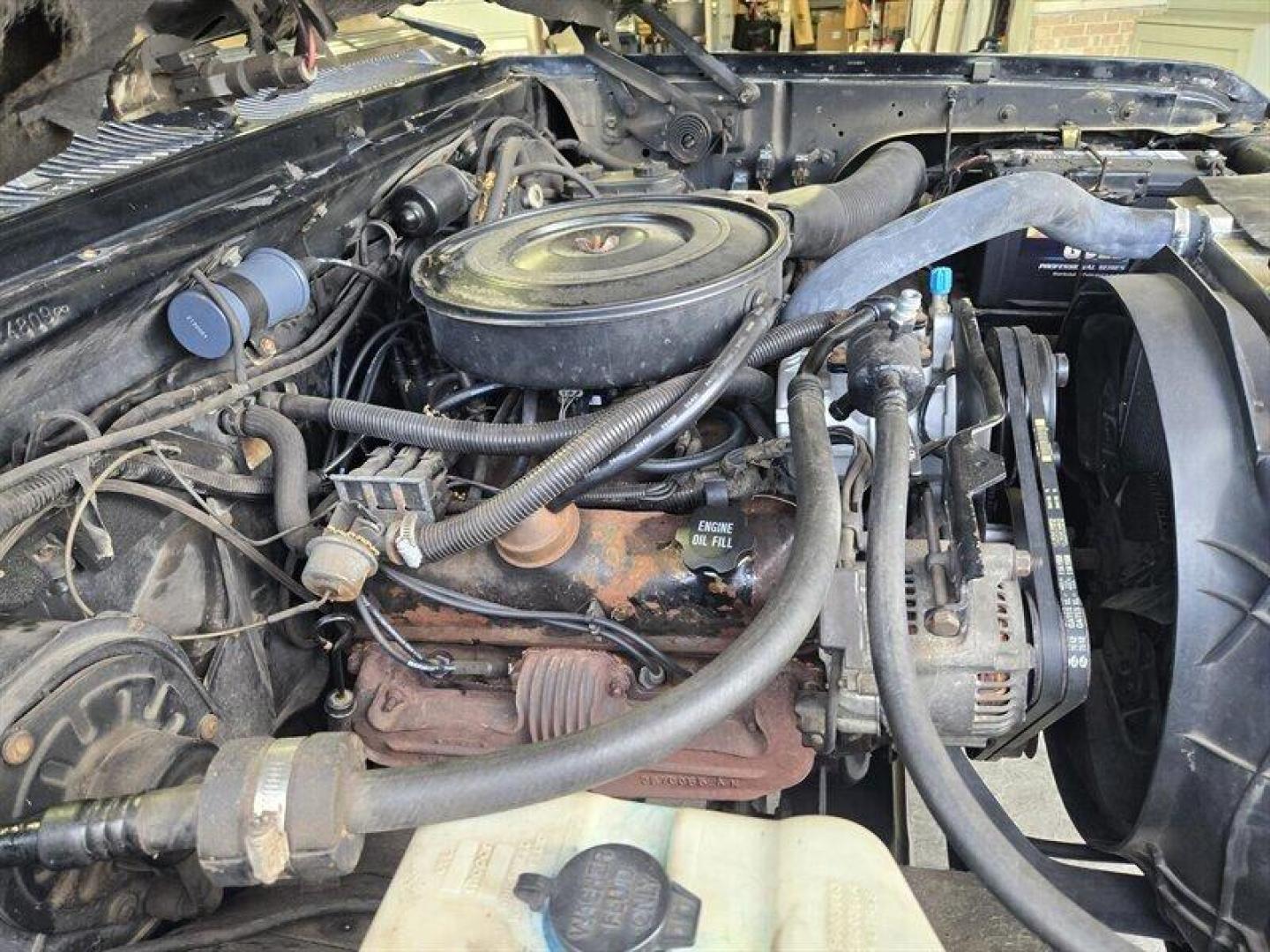 1992 Black Dodge Ramcharger CANYON SPORT (3B4GM17Z7NM) with an 5.9 engine, Automatic transmission, located at 25355 Eames Street, Channahon, IL, 60410, (815) 467-1807, 41.429108, -88.228432 - Presenting the 1992 Dodge Ramcharger CANYON SPORT. Equipped with a robust 5.9 engine, this classic vehicle boasts a range of factory default features that ensure a smooth and reliable driving experience. The exterior is finished in a sleek Black color, complemented by a warm Tan interior. With milea - Photo#27