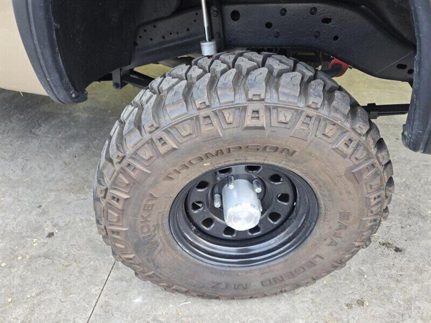 1992 Black Dodge Ramcharger CANYON SPORT (3B4GM17Z7NM) with an 5.9 engine, Automatic transmission, located at 25355 Eames Street, Channahon, IL, 60410, (815) 467-1807, 41.429108, -88.228432 - Presenting the 1992 Dodge Ramcharger CANYON SPORT. Equipped with a robust 5.9 engine, this classic vehicle boasts a range of factory default features that ensure a smooth and reliable driving experience. The exterior is finished in a sleek Black color, complemented by a warm Tan interior. With milea - Photo#29