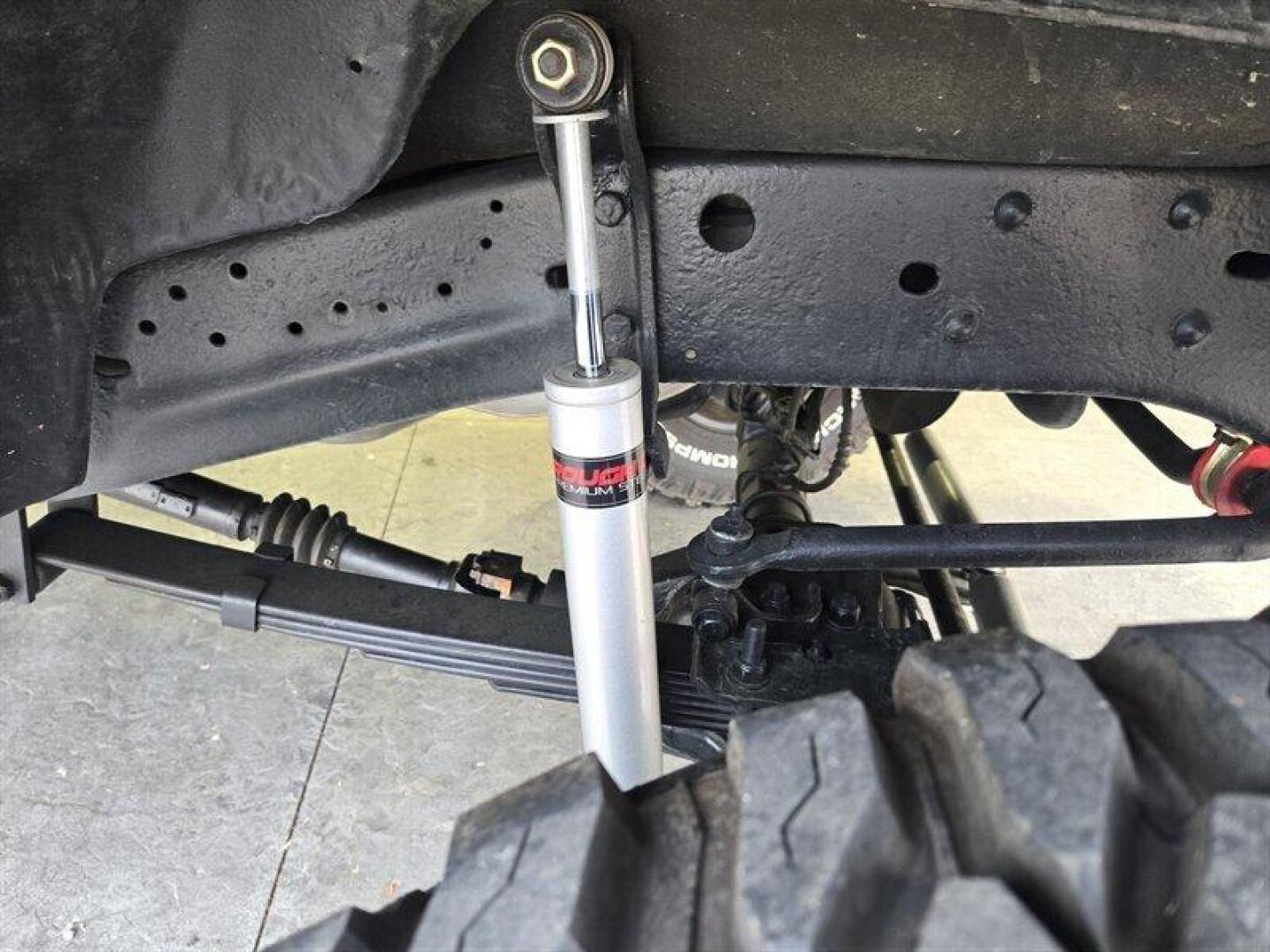 1992 Black Dodge Ramcharger CANYON SPORT (3B4GM17Z7NM) with an 5.9 engine, Automatic transmission, located at 25355 Eames Street, Channahon, IL, 60410, (815) 467-1807, 41.429108, -88.228432 - Presenting the 1992 Dodge Ramcharger CANYON SPORT. Equipped with a robust 5.9 engine, this classic vehicle boasts a range of factory default features that ensure a smooth and reliable driving experience. The exterior is finished in a sleek Black color, complemented by a warm Tan interior. With milea - Photo#30