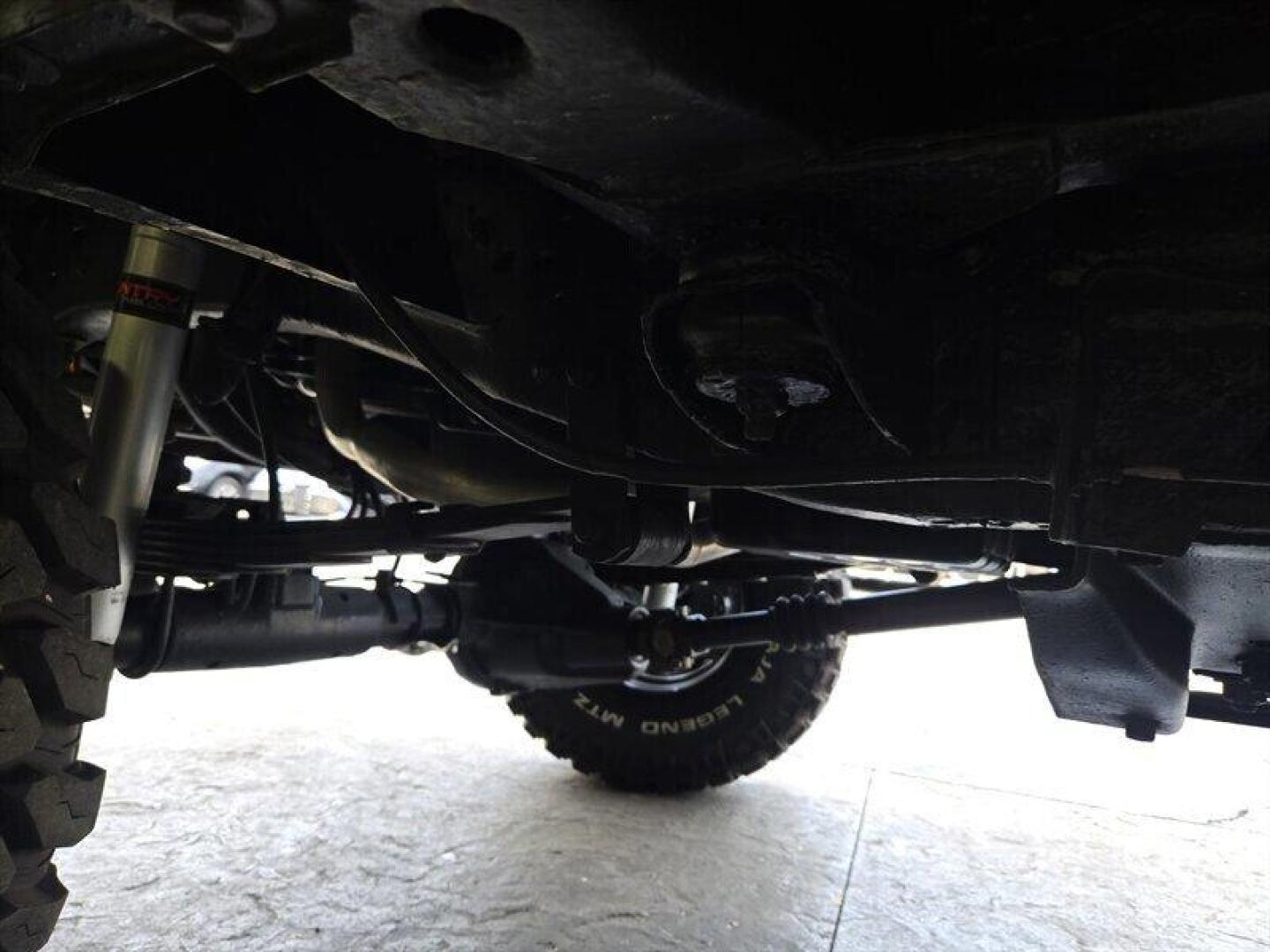 1992 Black Dodge Ramcharger CANYON SPORT (3B4GM17Z7NM) with an 5.9 engine, Automatic transmission, located at 25355 Eames Street, Channahon, IL, 60410, (815) 467-1807, 41.429108, -88.228432 - Presenting the 1992 Dodge Ramcharger CANYON SPORT. Equipped with a robust 5.9 engine, this classic vehicle boasts a range of factory default features that ensure a smooth and reliable driving experience. The exterior is finished in a sleek Black color, complemented by a warm Tan interior. With milea - Photo#35